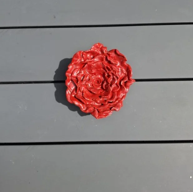 Red rose outside table.jpg