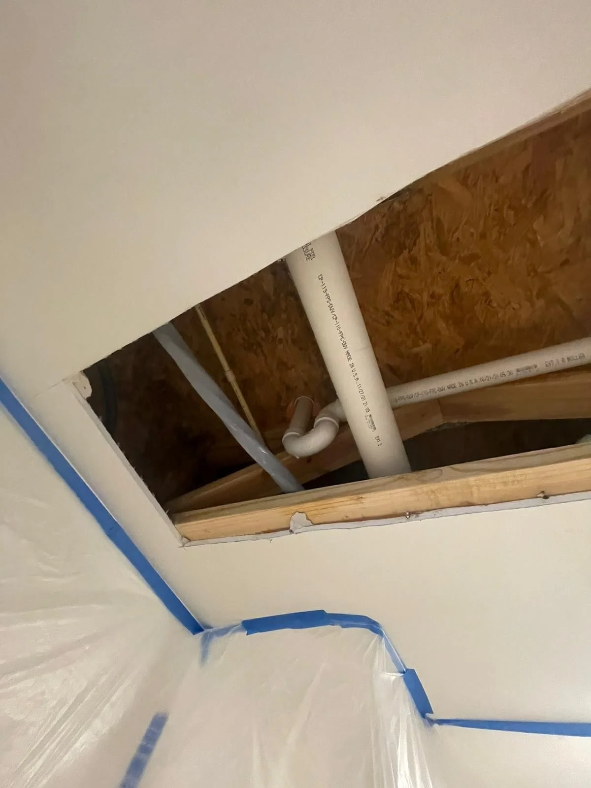 Tub was leaking through the ceiling , down from center light . Call Castaneda !