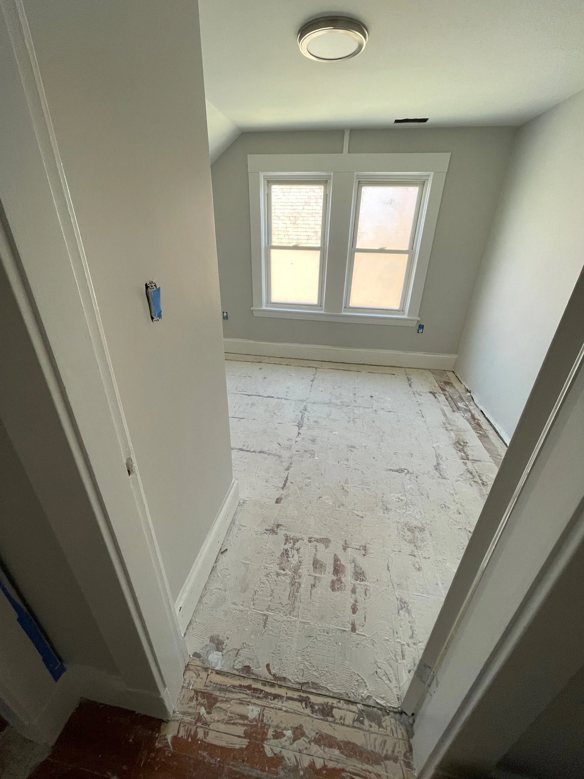 This stunning transformation showcases the craftsmanship and attention to detail from our team at Elemente Maison. In the first image, we can see the home before the installation of premium hardwood flooring, with the subflooring prepared for high-qu