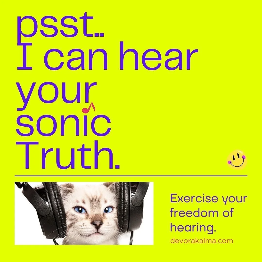 Bright yellow poster with purple text saying, 'psst.. I can hear your sonic Truth.' A small smiley face with headphones is in the upper right corner. The bottom part features an image of a cat with blue eyes wearing large headphones, alongside purple text encouraging exercise of hearing freedom, and a website link 'devorakalma.com'.