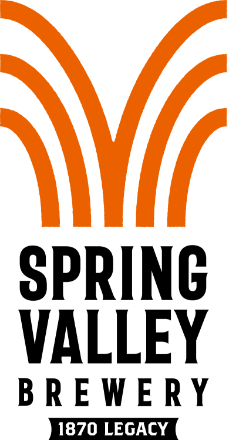 Orange and black stylized design resembling a fountain or arch pattern with the text '1870 LEGACY' at the bottom.
