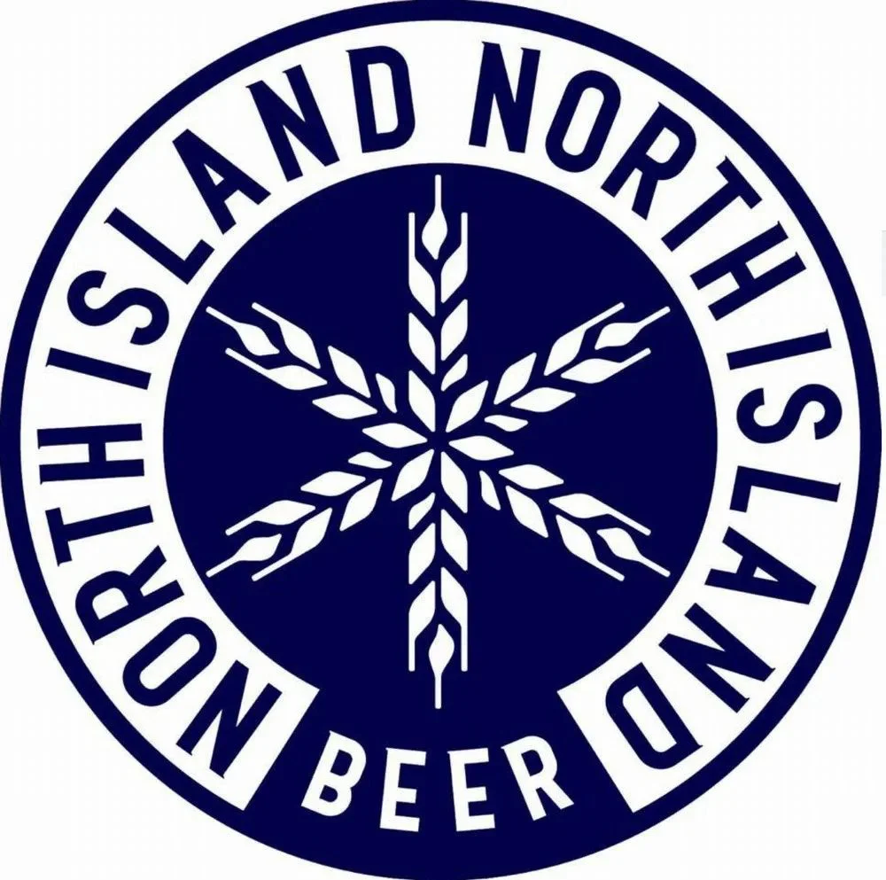 A circular logo with the text 'NORTHERN ISLAND LAND NORTH ISLAND BEER' around the border. The center features a stylized snowflake or star design.