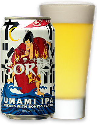 A can of Sorie Umami IPA beer with a colorful label featuring a character with spiky hair and flames, next to a glass of pale yellow beer.
