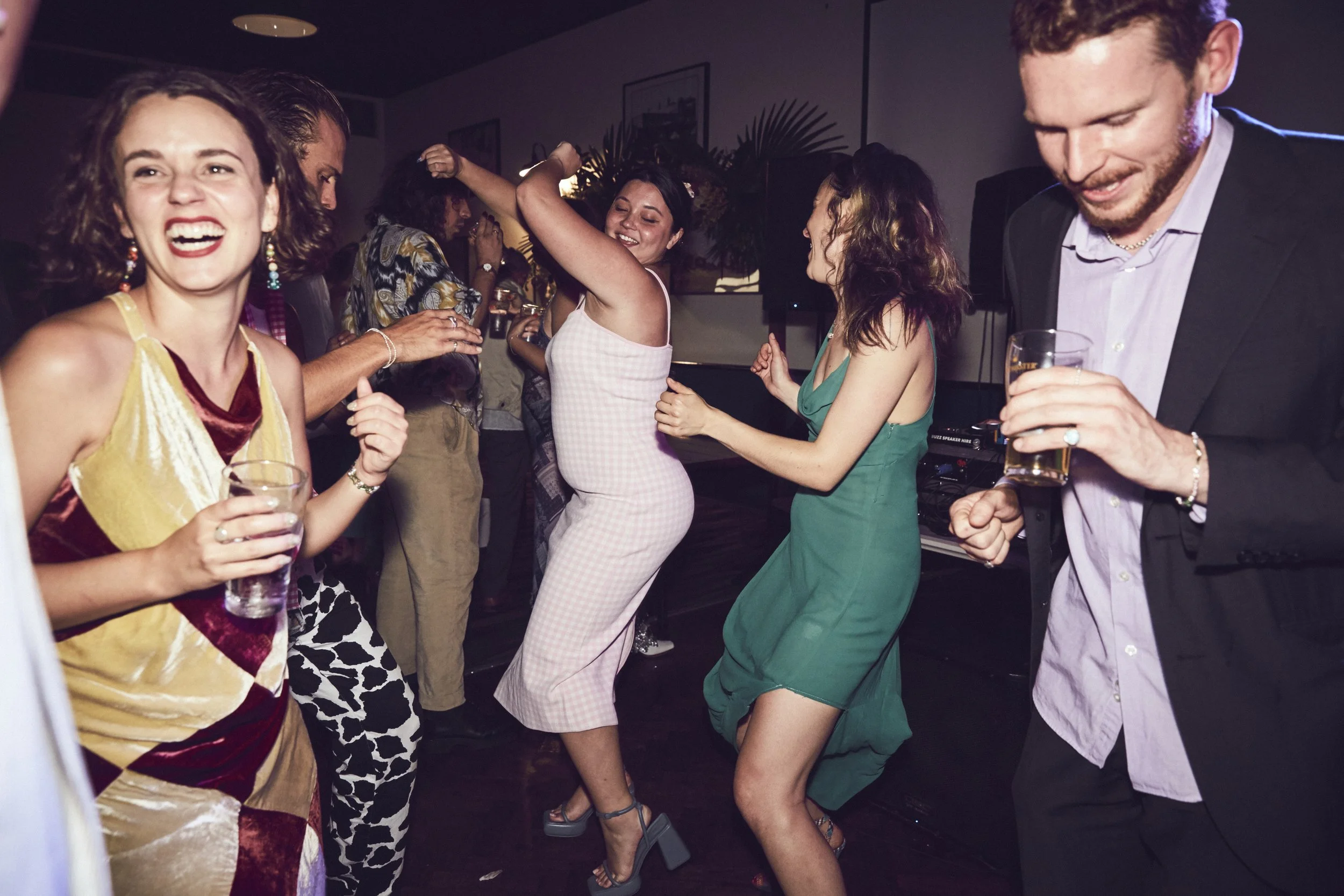 Group of people dancing and having fun at a party