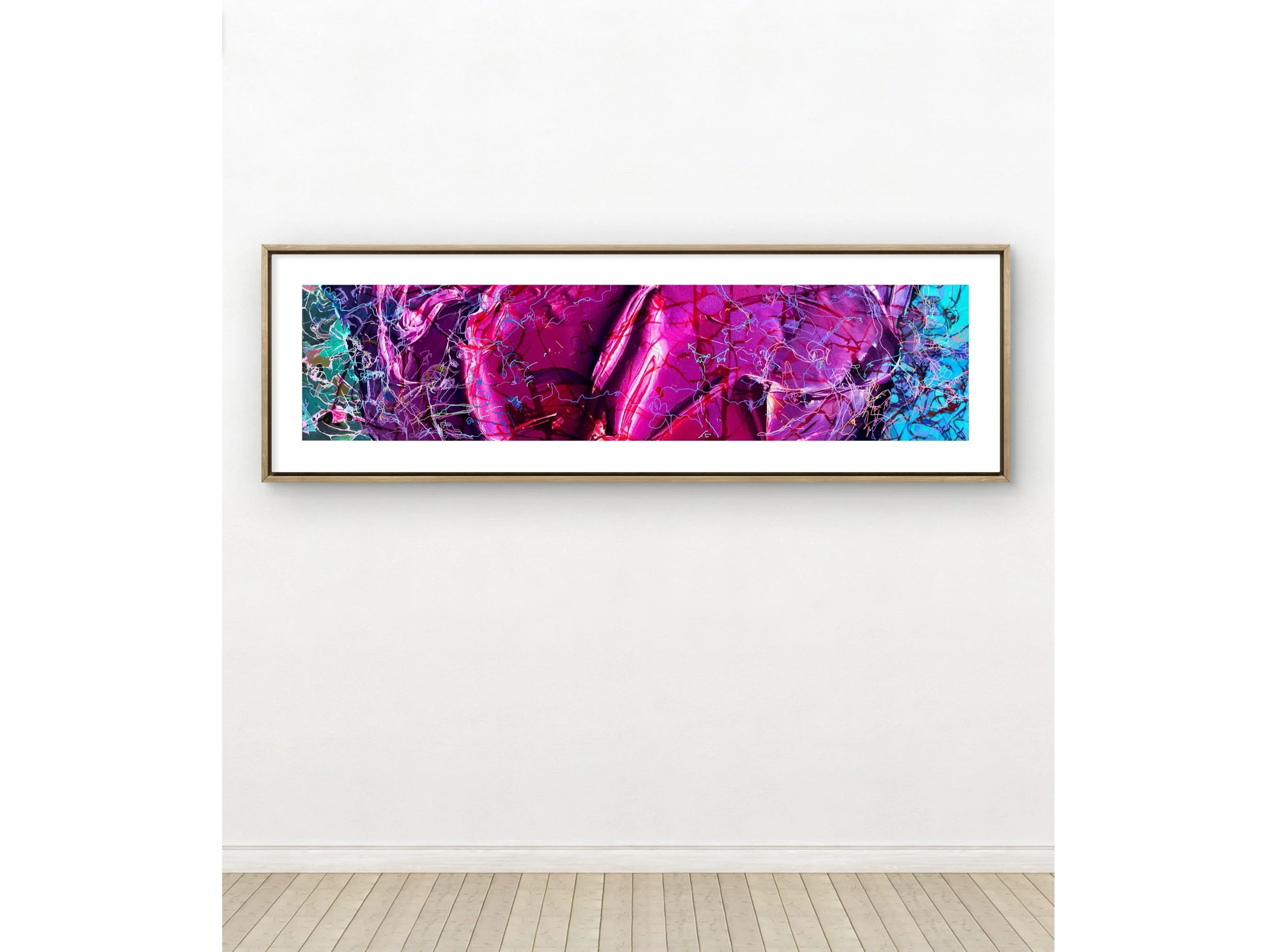 A colorful abstract painting with pink, purple, blue, and black hues, displayed in a wooden frame on a white wall.