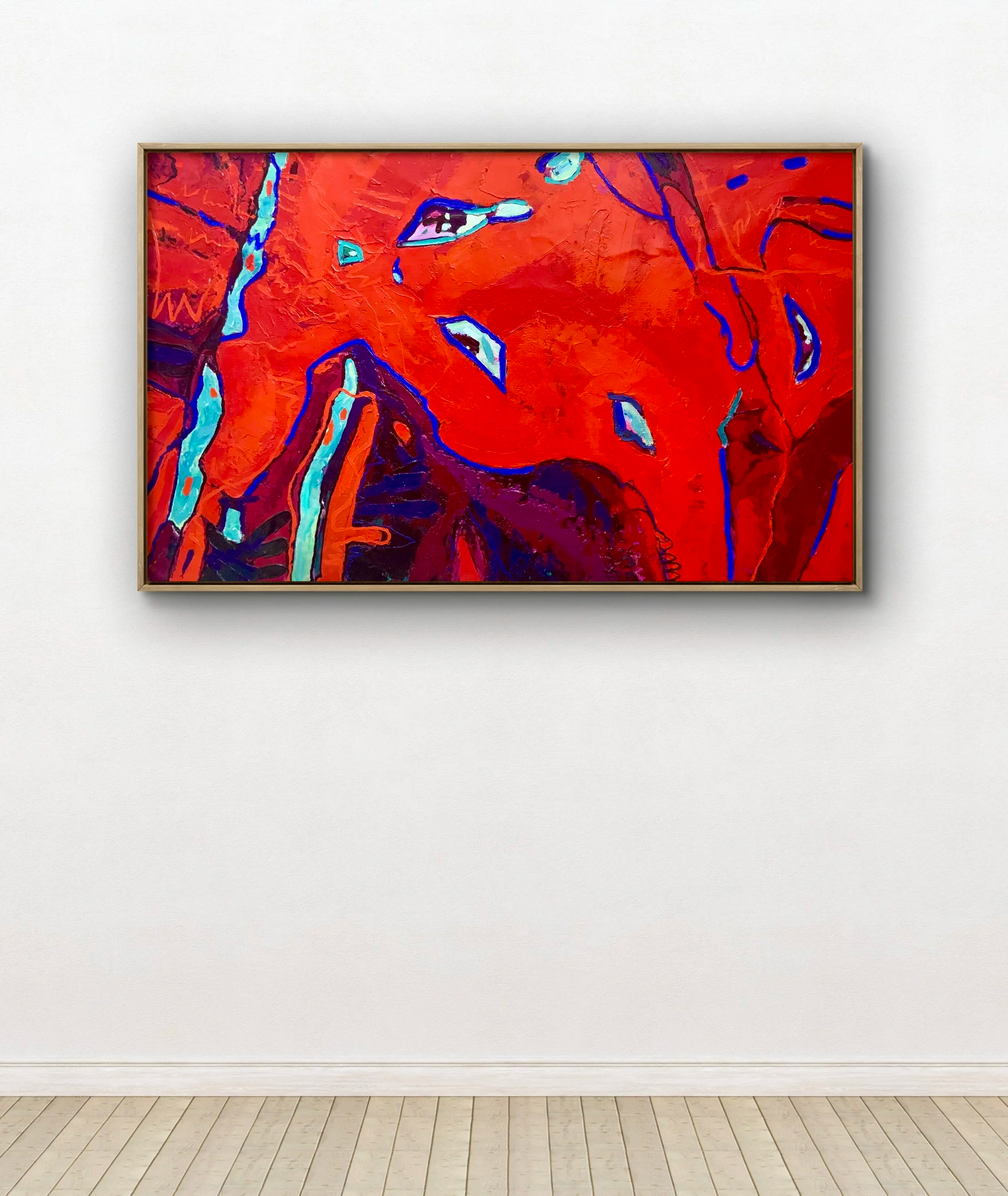 An abstract painting with a red background and blue, purple, and light blue accents, framed and displayed on a white gallery wall.