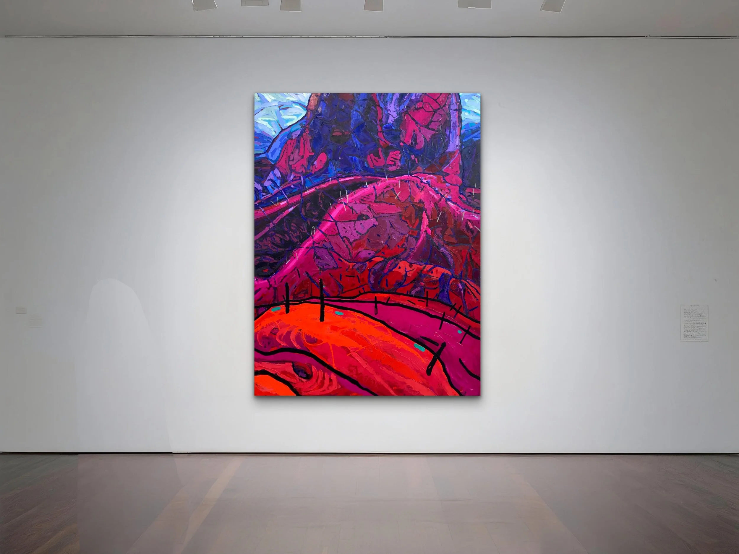 Colorful abstract painting with vibrant pinks, purples, and reds on a white gallery wall.