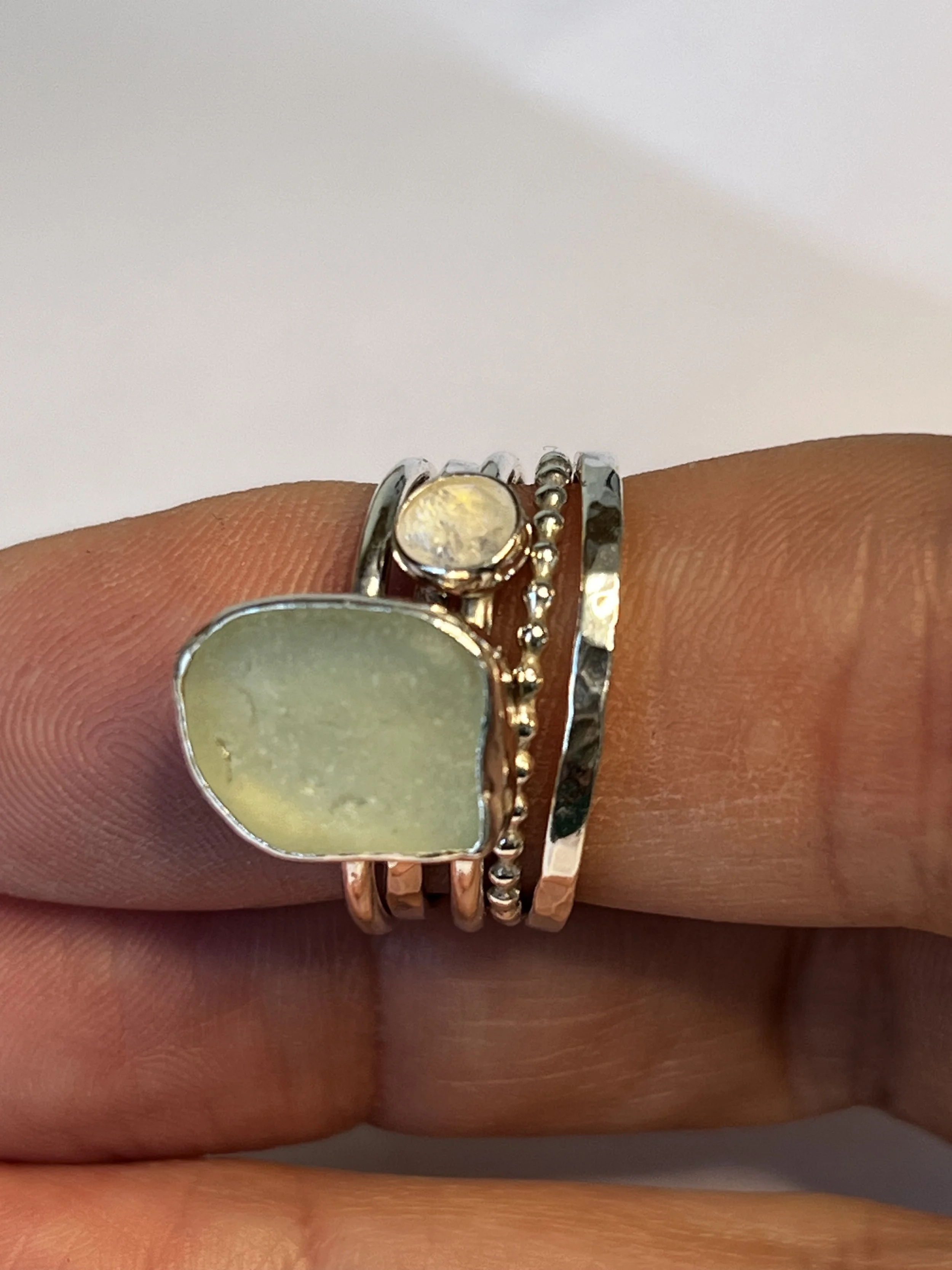 5 Rings including sea glass and moonstone
