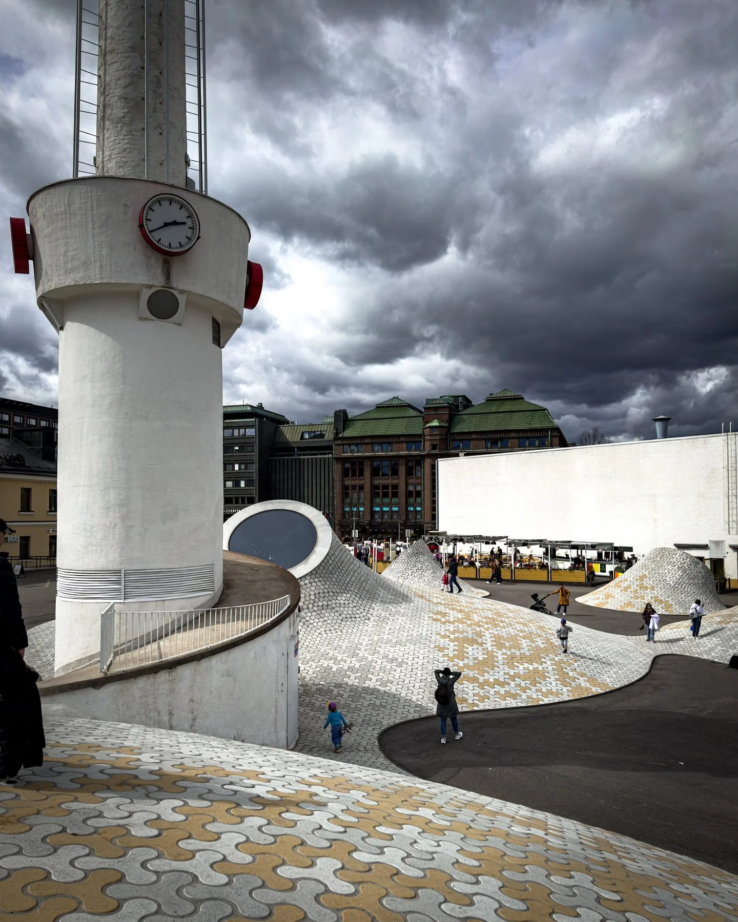 A cloudy afternoon in Helsinki, walking through Lasipalatsi Square &mdash; where modern design meets daily life. The clean architecture, open layout, and nearby caf&eacute;s make it one of those places that quietly capture the city&rsquo;s character.