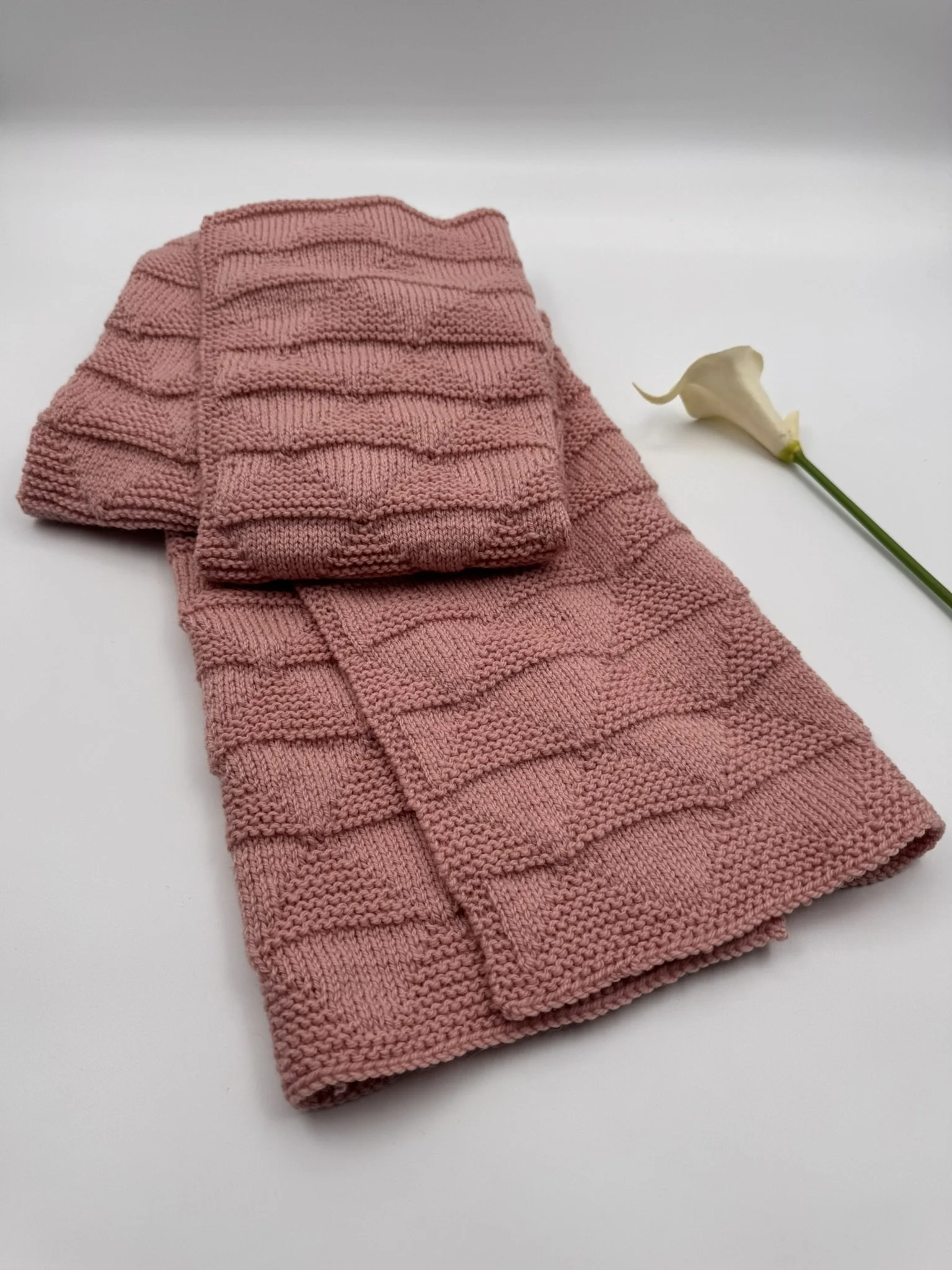 Knit Girl - Blanket Pink Dusty Folded From the Front.JPEG