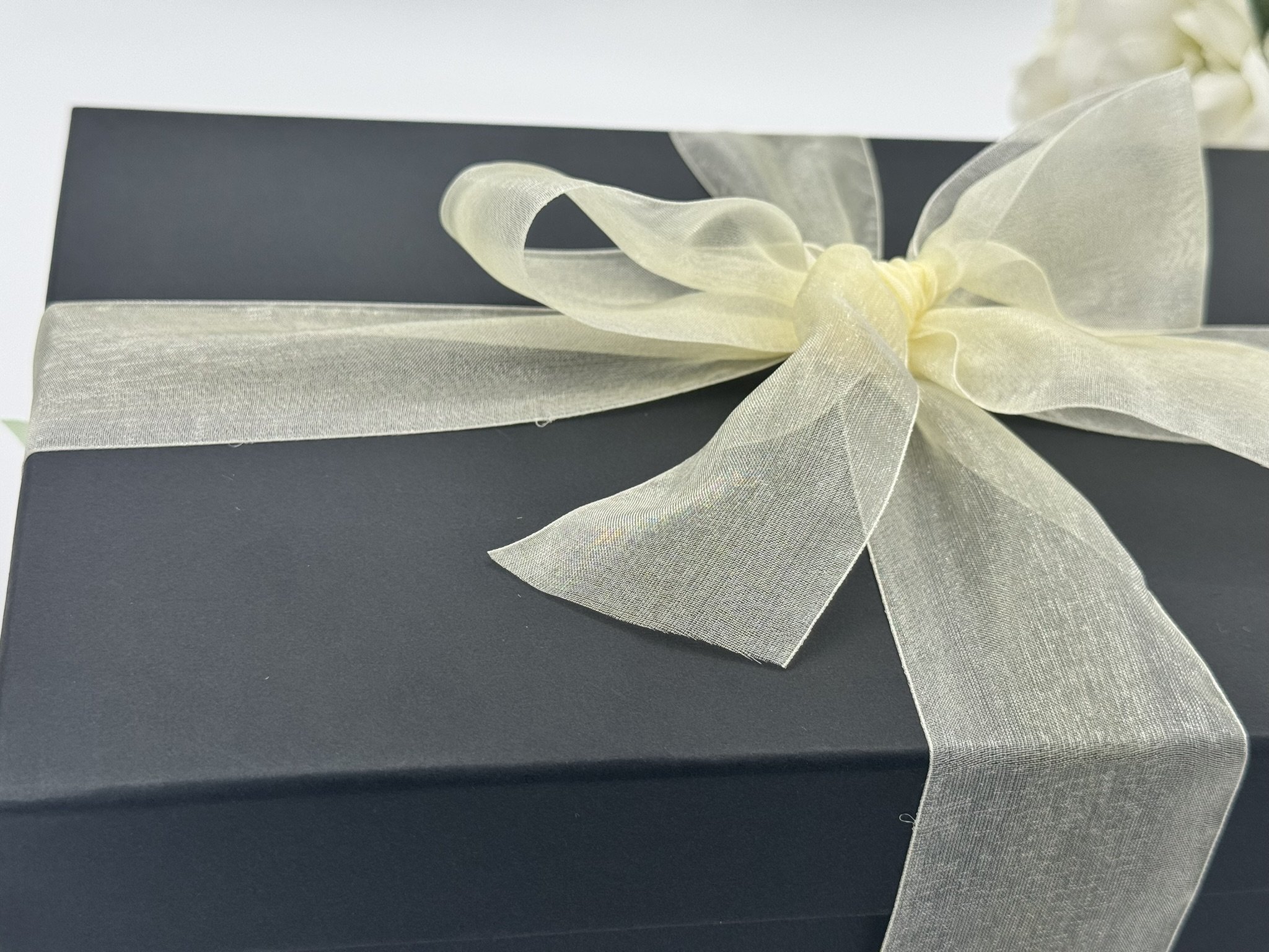 Essential - Black Box Cream Ribbon Across the Top.JPEG