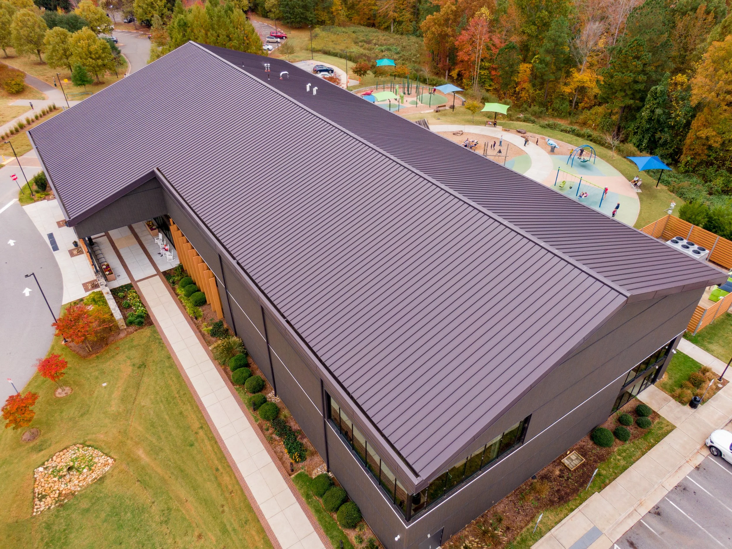New metal roof and guttering on large building.