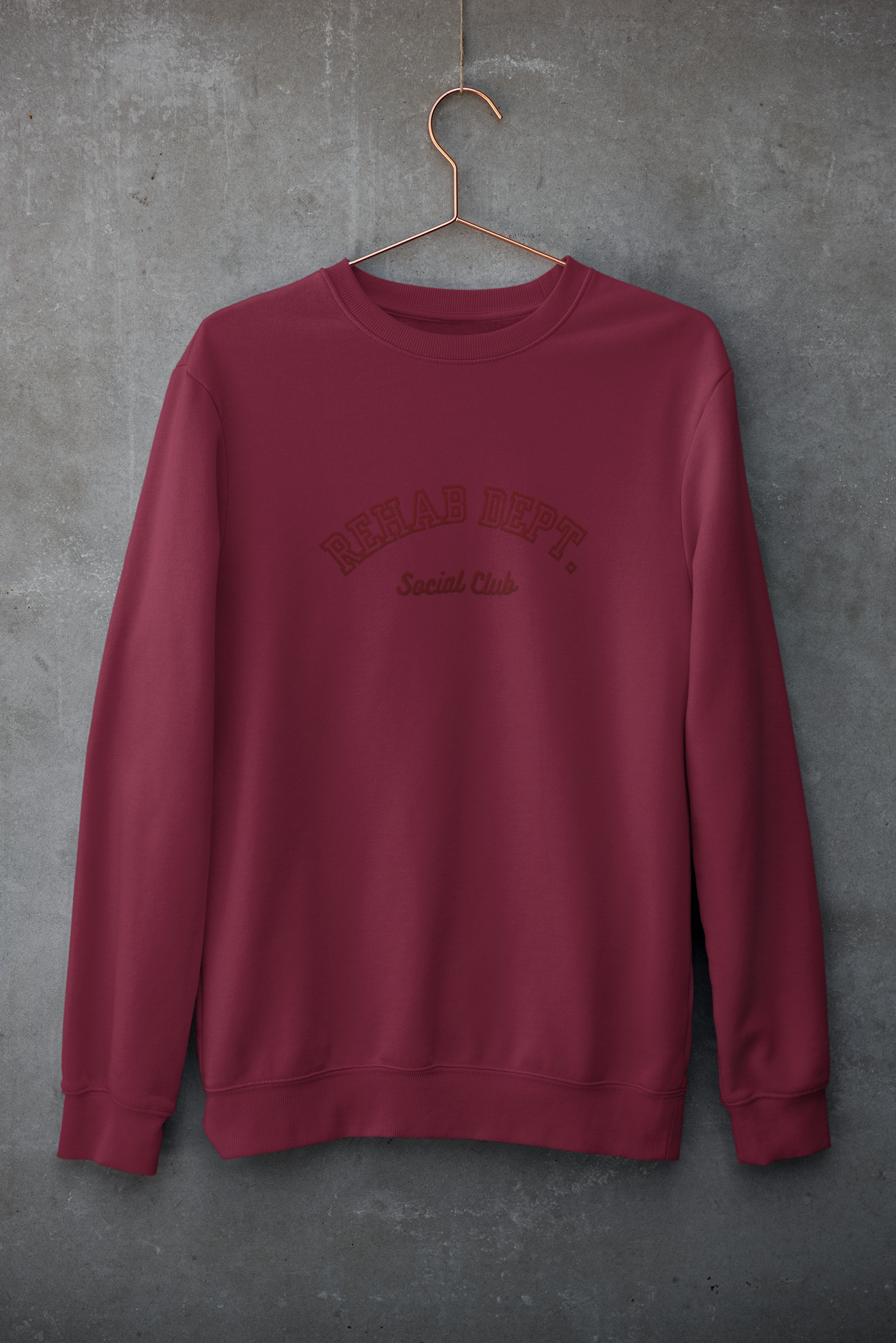 mockup-of-a-customizable-crewneck-sweatshirt-hanging-against-a-concrete-wall-33997 (6).png