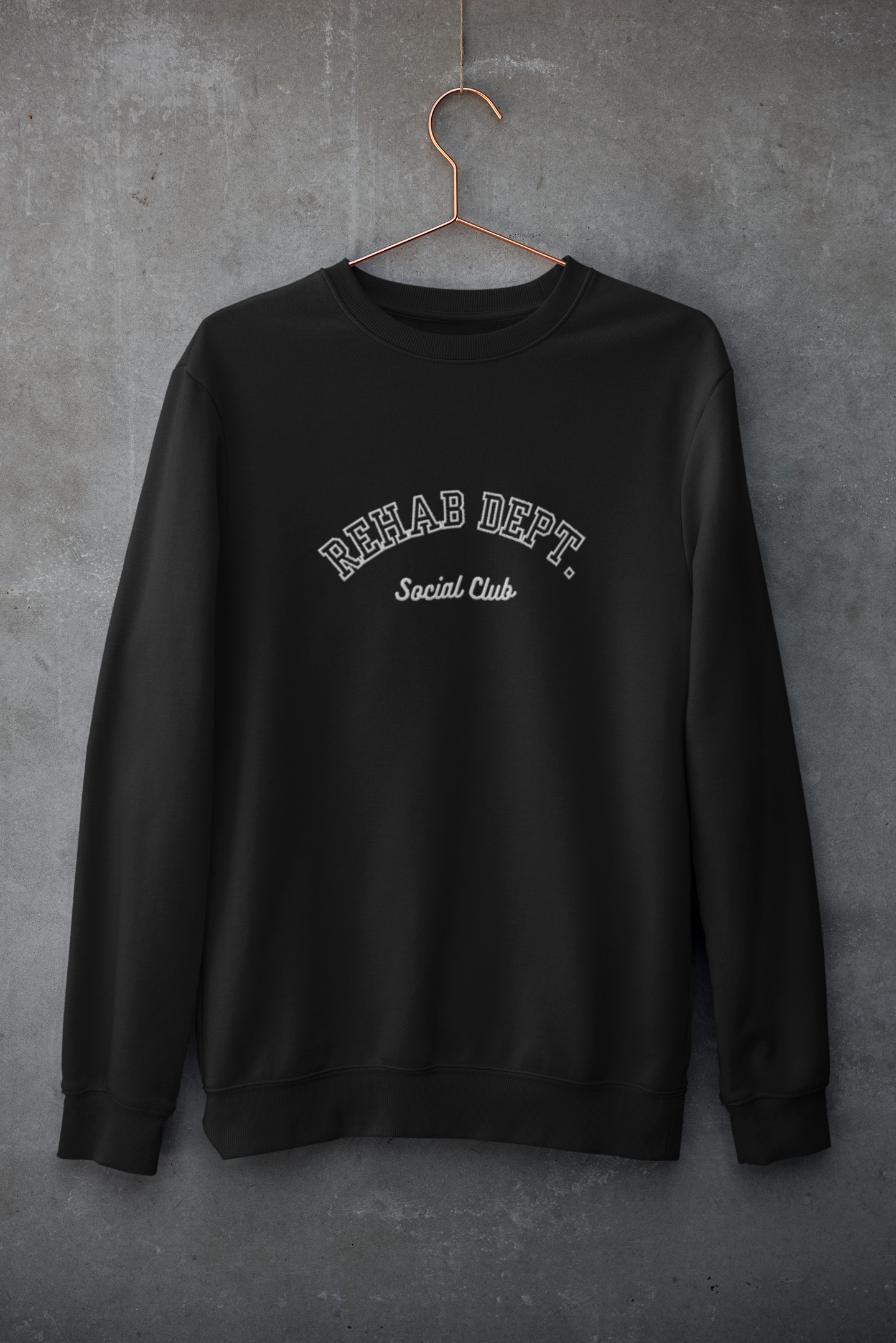 mockup-of-a-customizable-crewneck-sweatshirt-hanging-against-a-concrete-wall-33997 (2).png