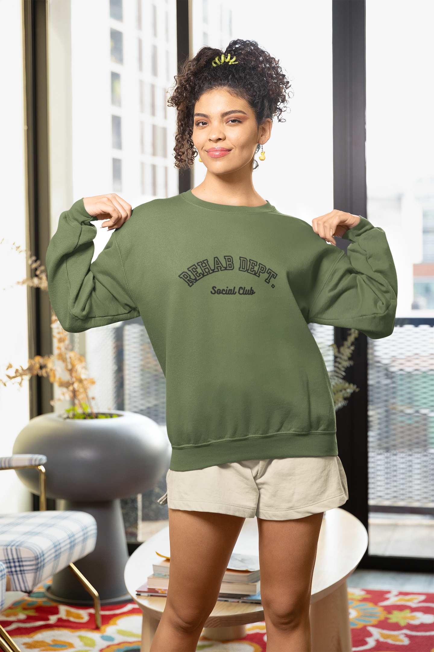mockup-of-a-woman-with-curly-hair-posing-in-a-gildan-sweatshirt-m32074.png