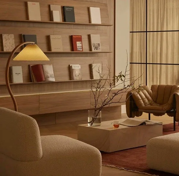 Where comfort meets creativity&mdash;this office lounge redefines workspace elegance with warm tones and tactile textures. ✨📖 #OfficeDesign #workplacewellness 

Design: Forme
📸: Lillie Thompson