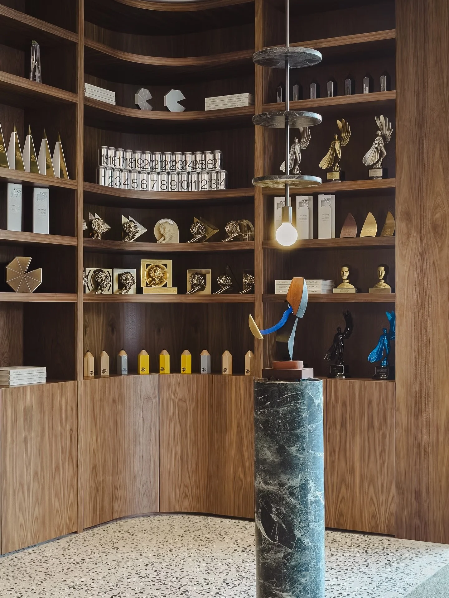 Bundarra, Surry Hills
 A workplace shaped by dialogue - between old and new, history and ambition.

A restored Victorian terrace meets a contemporary extension defined by patinated zinc fins and curved glass. Inside, intimate heritage rooms sit along