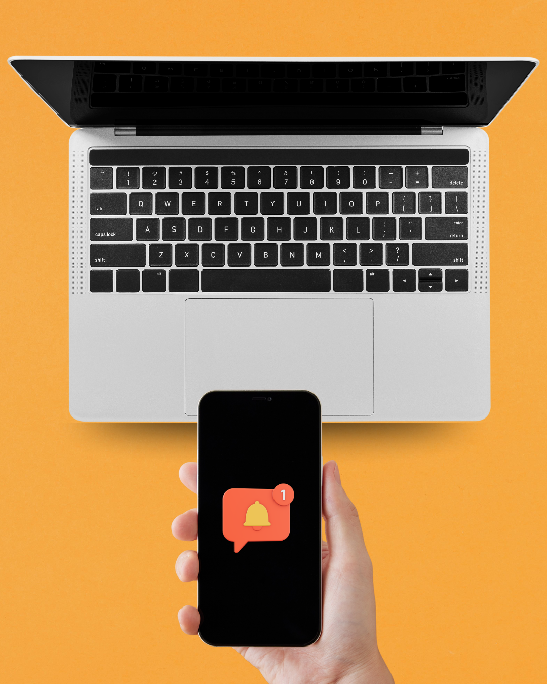 Laptop and smartphone with notifications, representing digital growth, lead generation and performance marketing.