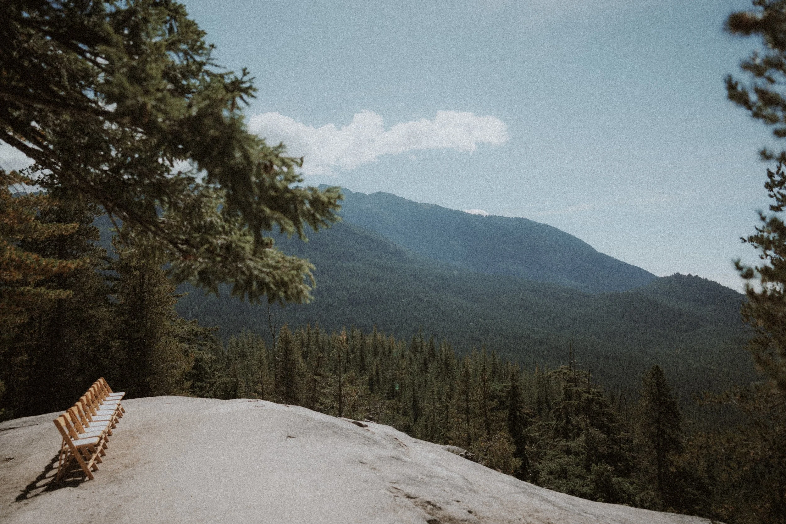 Empty ceremony chairs on a rocky mountain viewpoint at Sea to Sky Gondola.