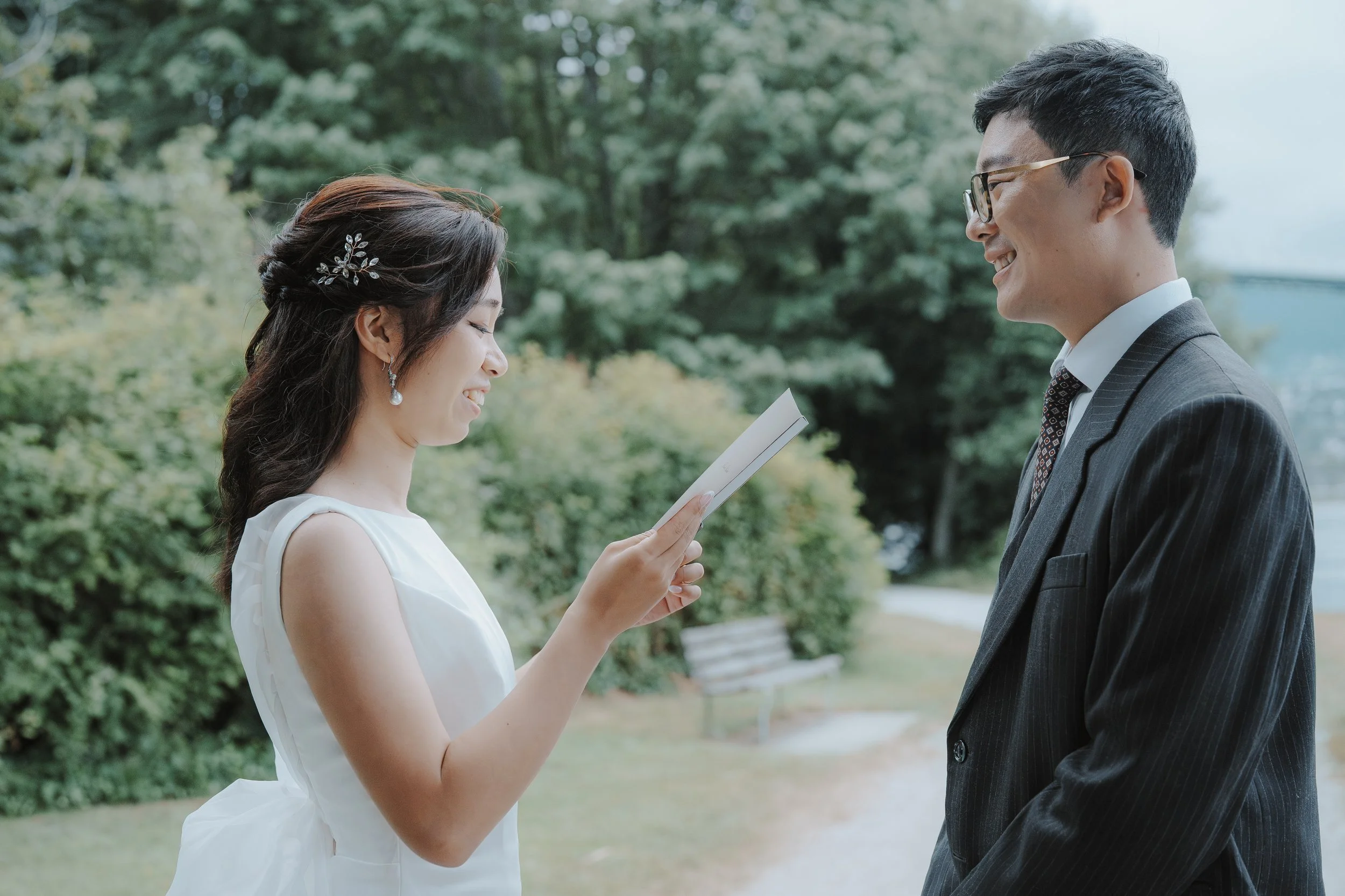 Chloe and Marco looking at their keepsake card together