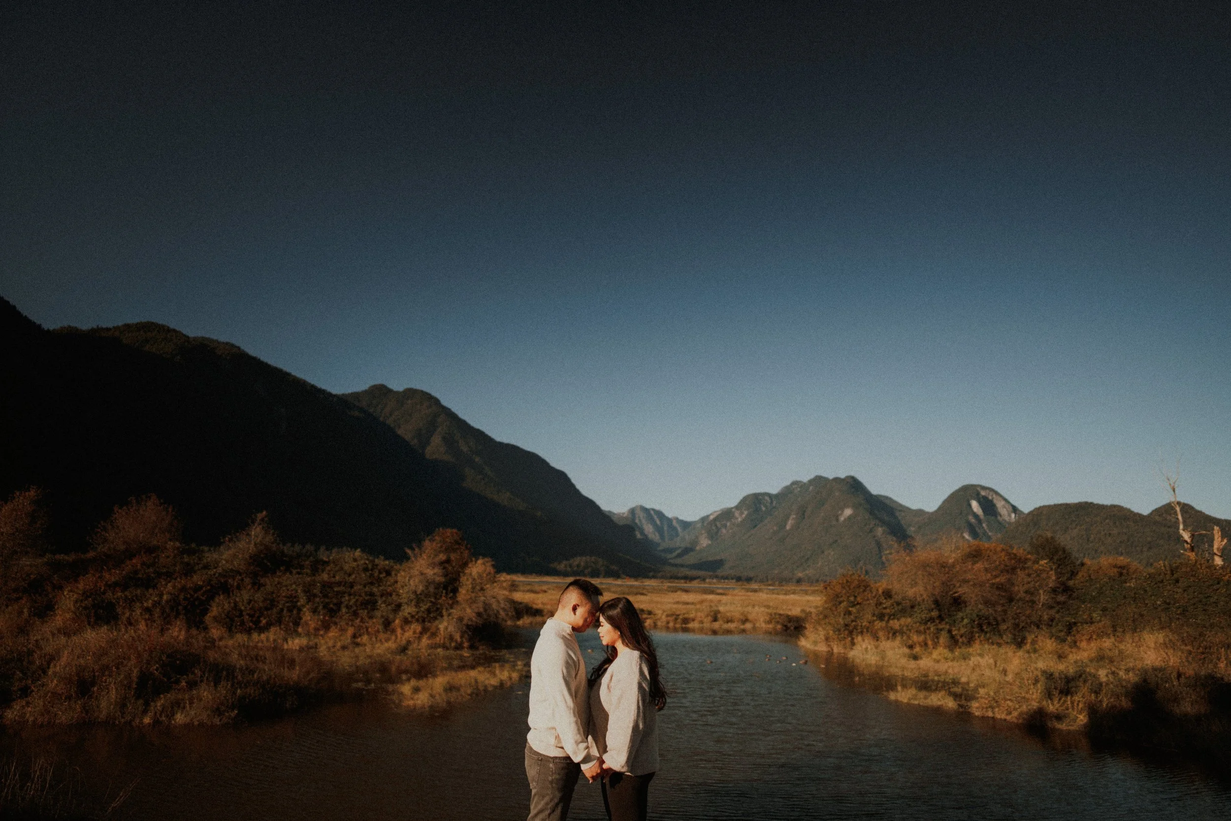  A sincere embrace against the vast, beautiful backdrop of the Pitt Lake landscape. 