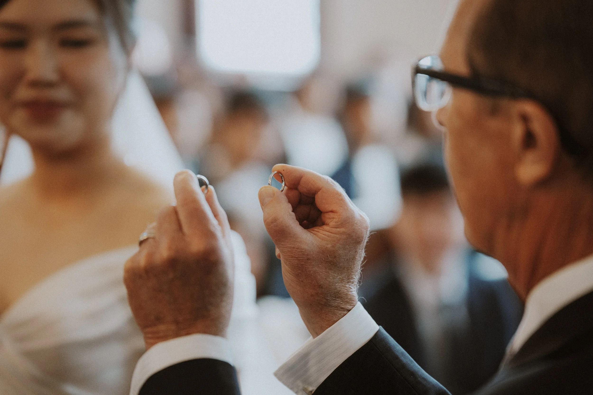  A tender, candid close-up of the rings being presented during the  Minoru Chapel  ceremony. 