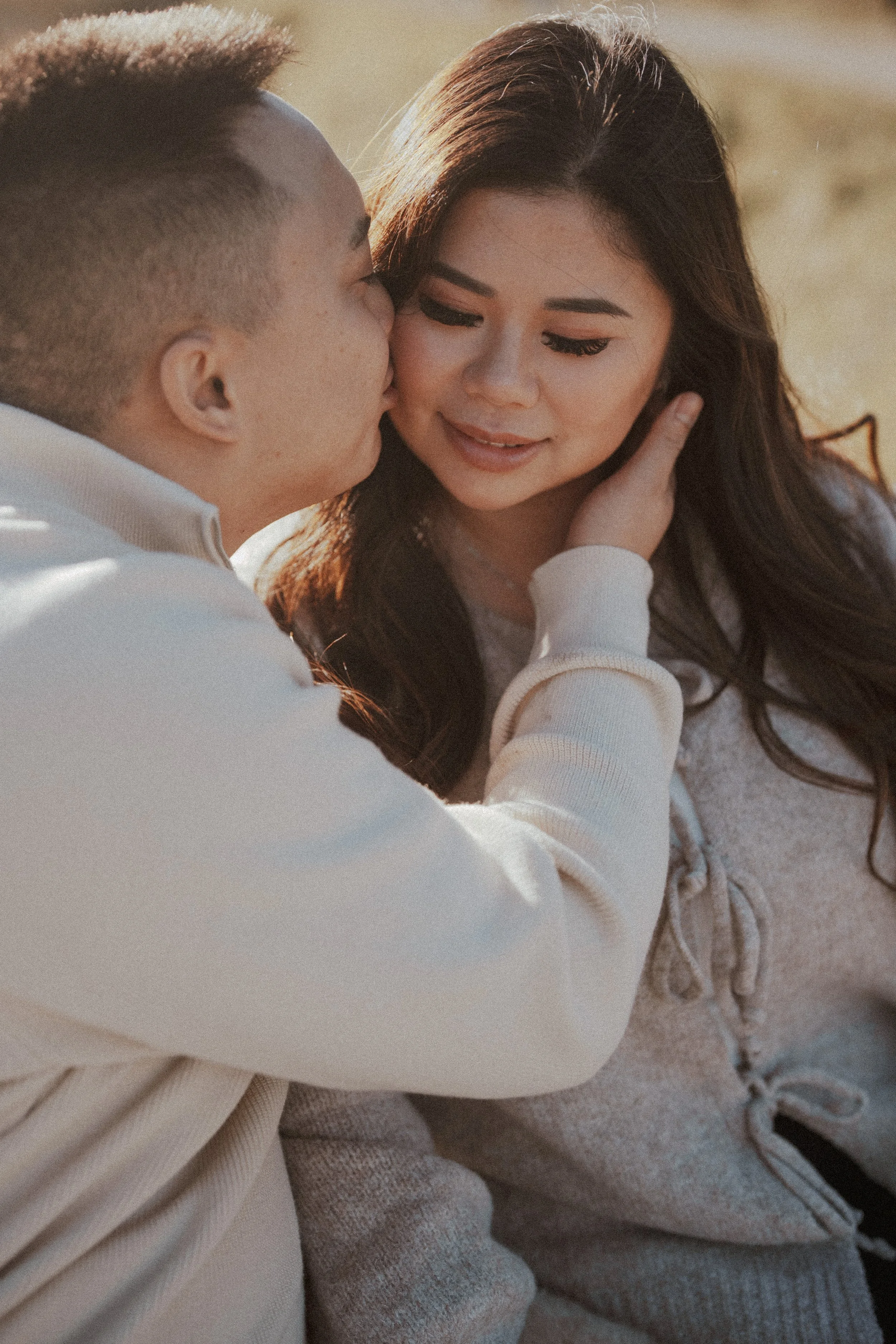  A tender close-up, capturing the sincere affection shared between the couple. 