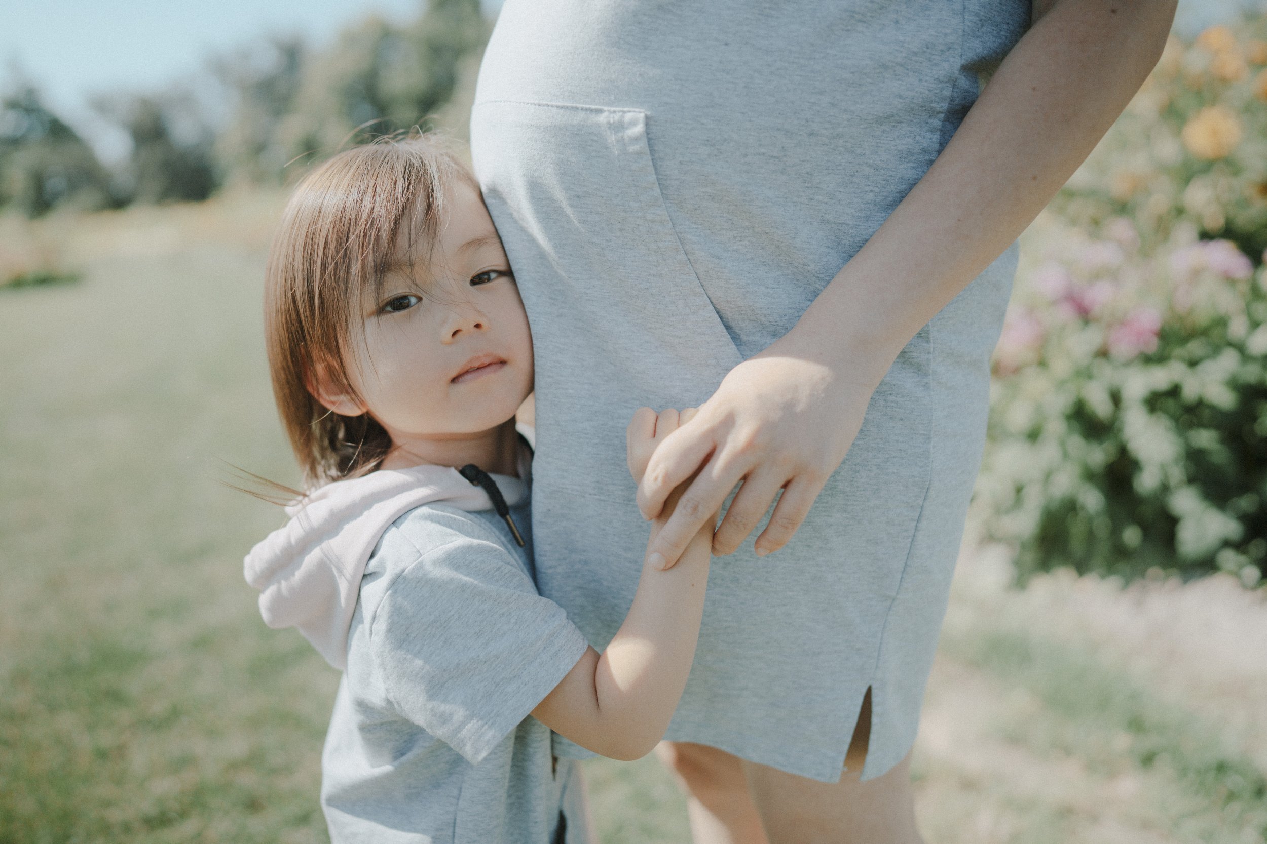  She rested her head gently, holding my hand. The bump, the light, the quiet—it felt soft and full. I didn’t need to say anything. Just let it be. 