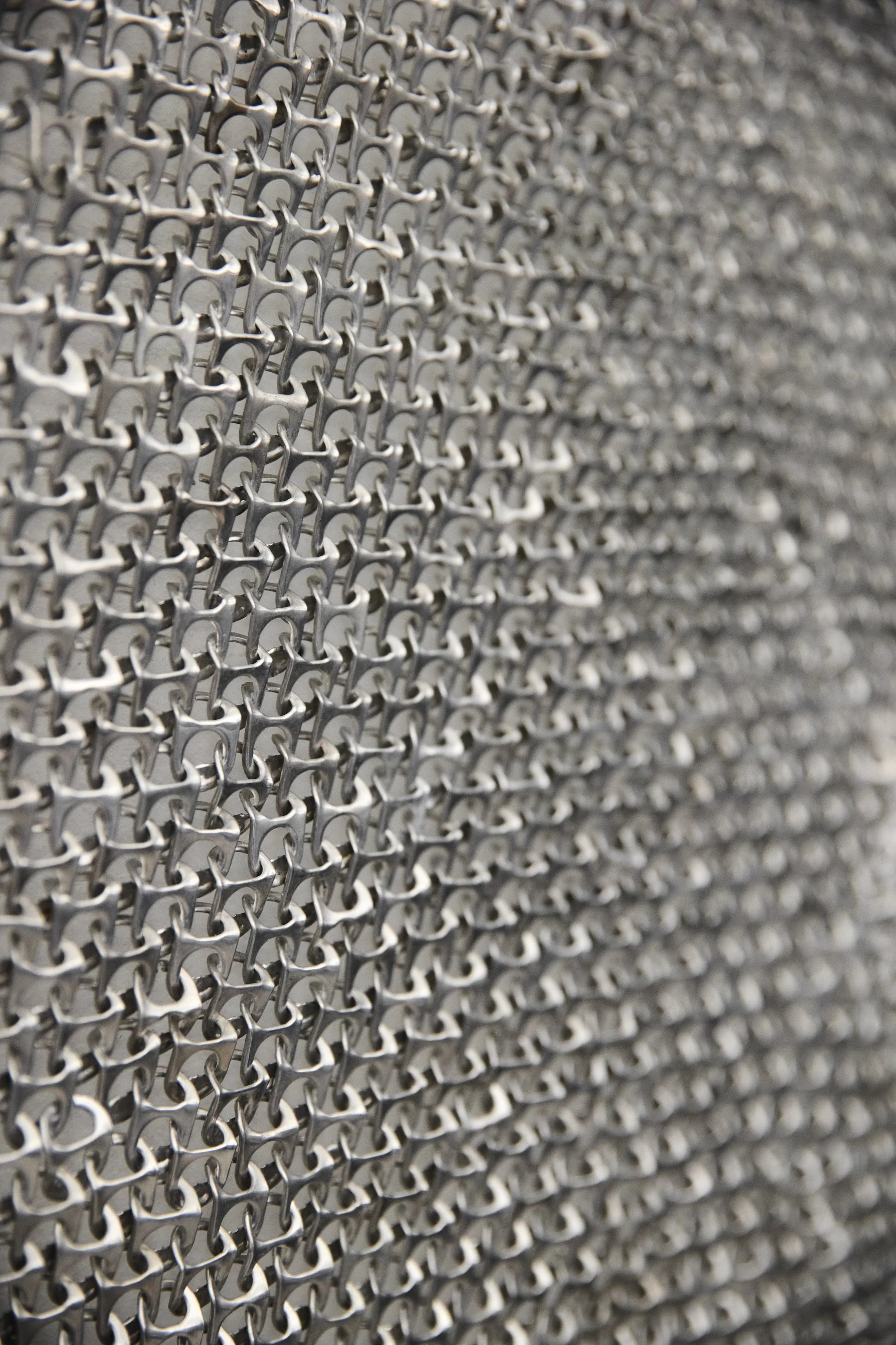 CONNECTIVE TISSUE I   
Artist consumed aluminum can tabs, hand woven
