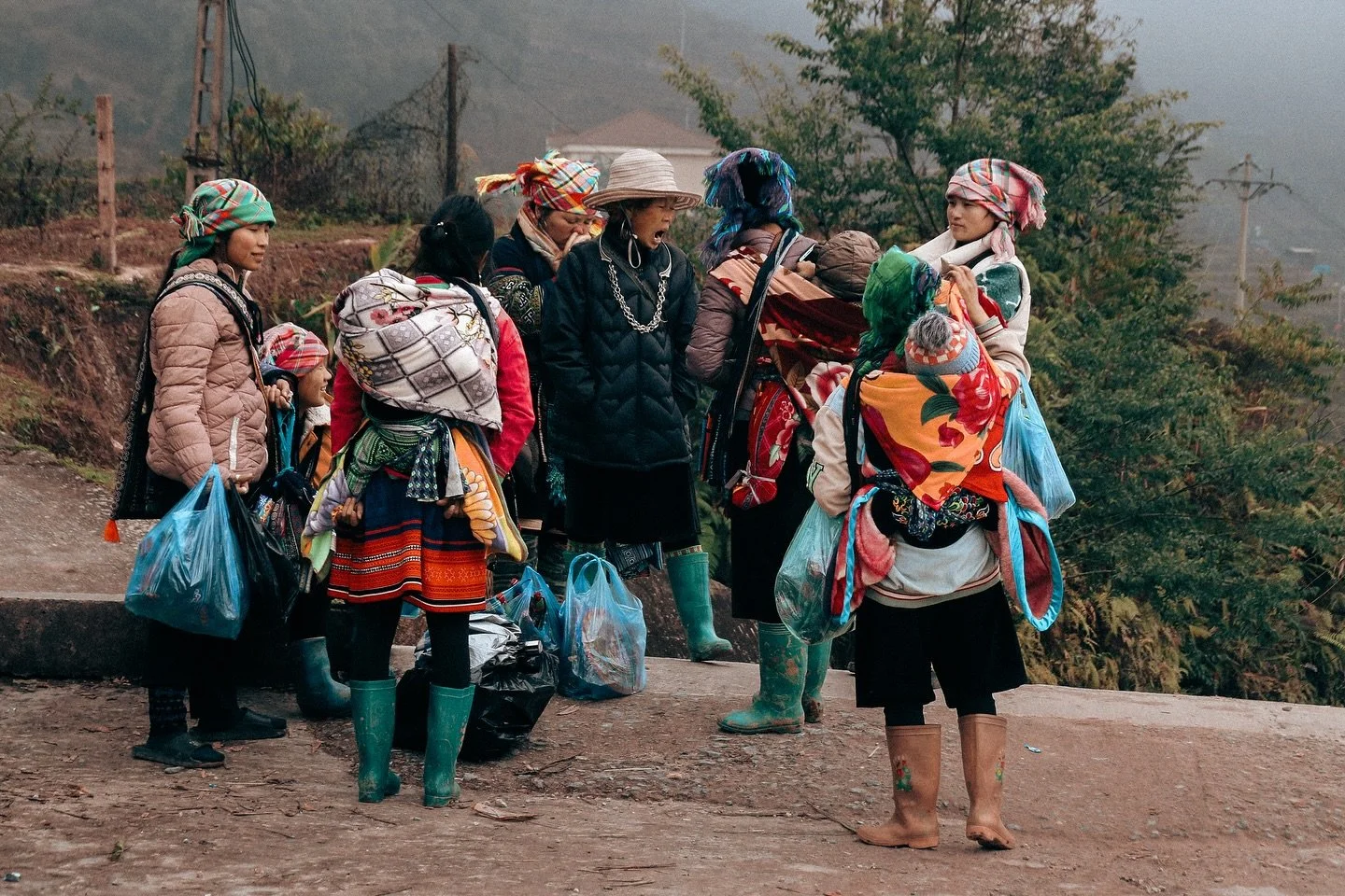 The day&rsquo;s stories shared between errands. In Sapa&rsquo;s streets, women paused to exchange the small moments that punctuate their day. 
.
.
.
.
#photo #photoshoot #photographer #photos #photography #photograph #travelphotos #travelphoto #trave