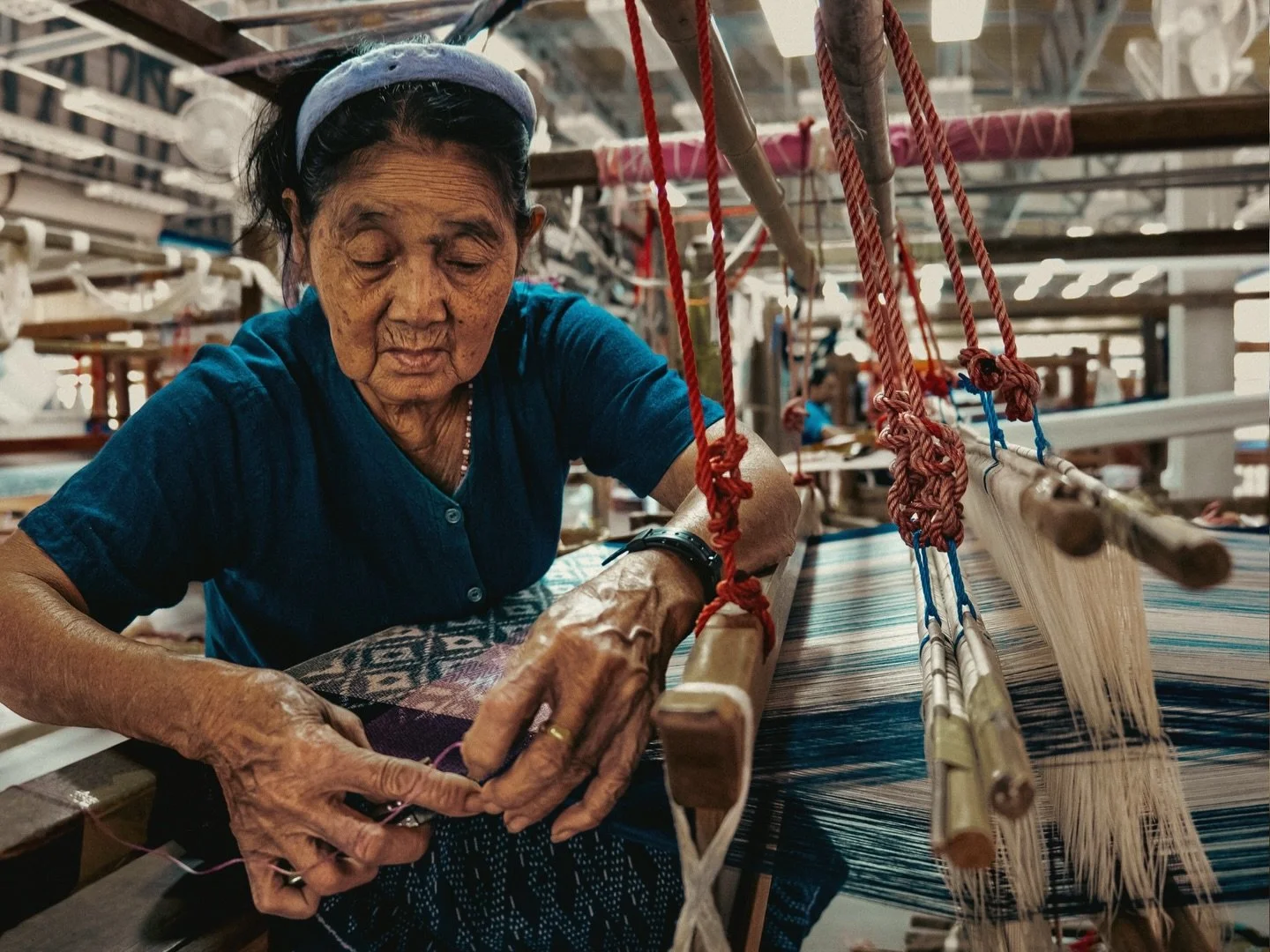 In Sakon Nakhon, indigo isn&rsquo;t just a dye. It&rsquo;s the backbone of a rural creative economy that has quietly revived the province. 

More than 50 village groups now produce indigo textiles, generating up to 40 million THB and breathing new ec