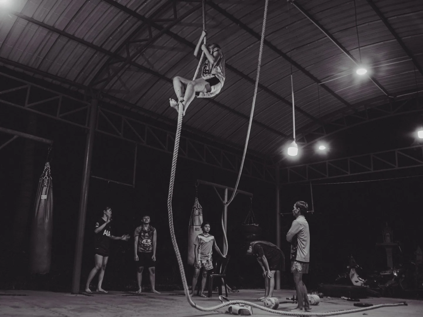 At Por MueangPhet, training starts after school and stretches into the night, sometimes as late as 9 pm. 
.
.
.
.
#muay #muaythailife #muaythaiphotography #documentaryphoto #photojournalism