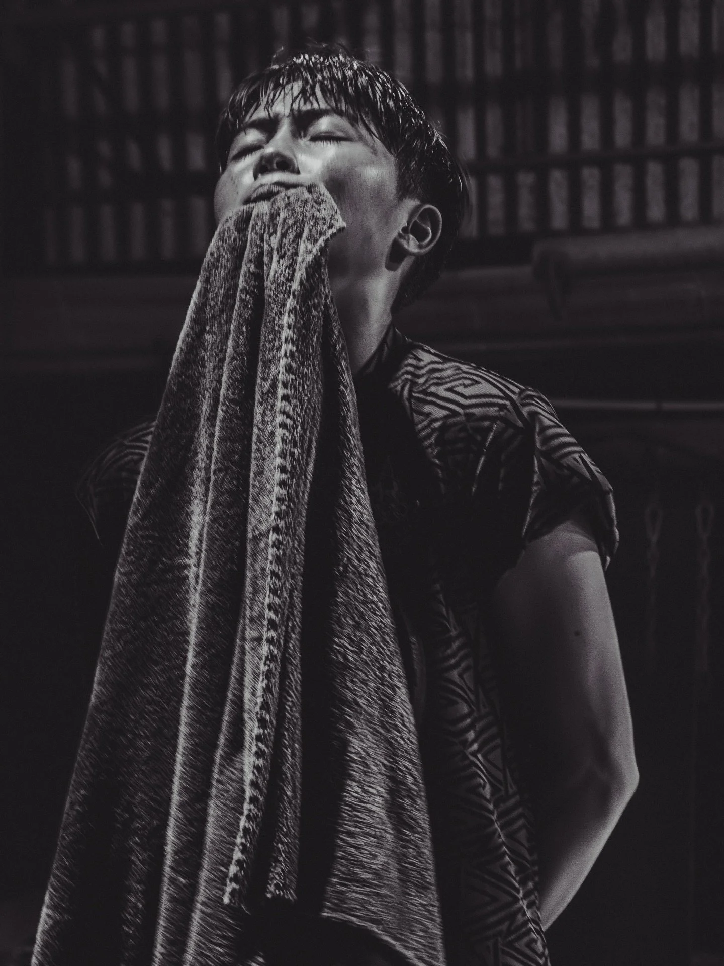 Namfon Thawila, 19, trains while preparing for a regional Kiatpetch event &mdash; a potential pathway toward eligibility at Rajadamnern Stadium. 

During conditioning, she strengthens her neck by biting down on a weighted dumbbell wrapped in a towel,