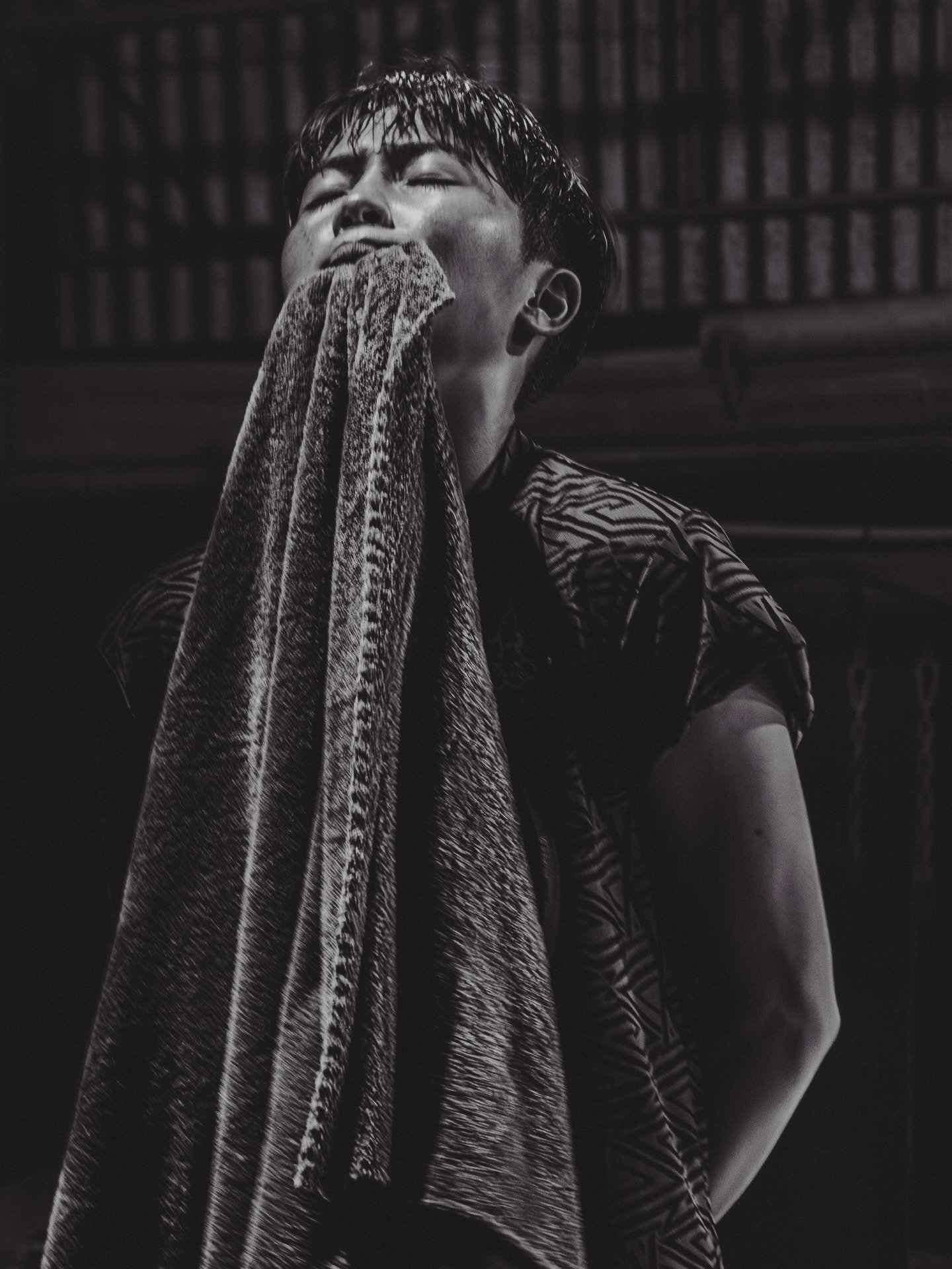 Namfon Thawila, 19, trains while preparing for a regional Kiatpetch event &mdash; a potential pathway toward eligibility at Rajadamnern Stadium. 

During conditioning, she strengthens her neck by biting down on a weighted dumbbell wrapped in a towel,