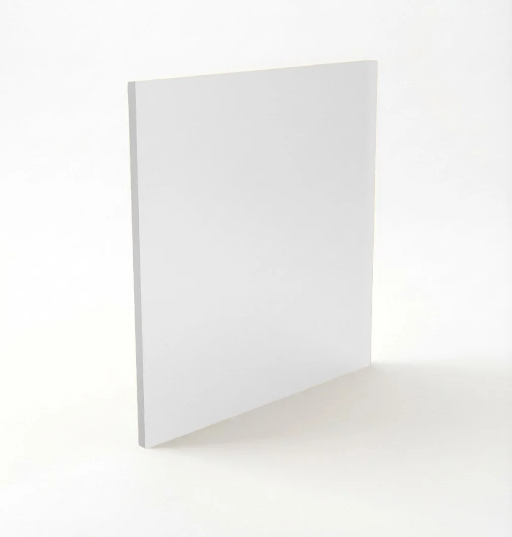 A plain white blank book or notebook standing upright against a white background.