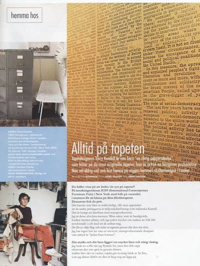Close-up of a newspaper and a small image of a bathroom with a toilet, sink, and decorative plants. Text in Swedish about wallpaper and interior design.