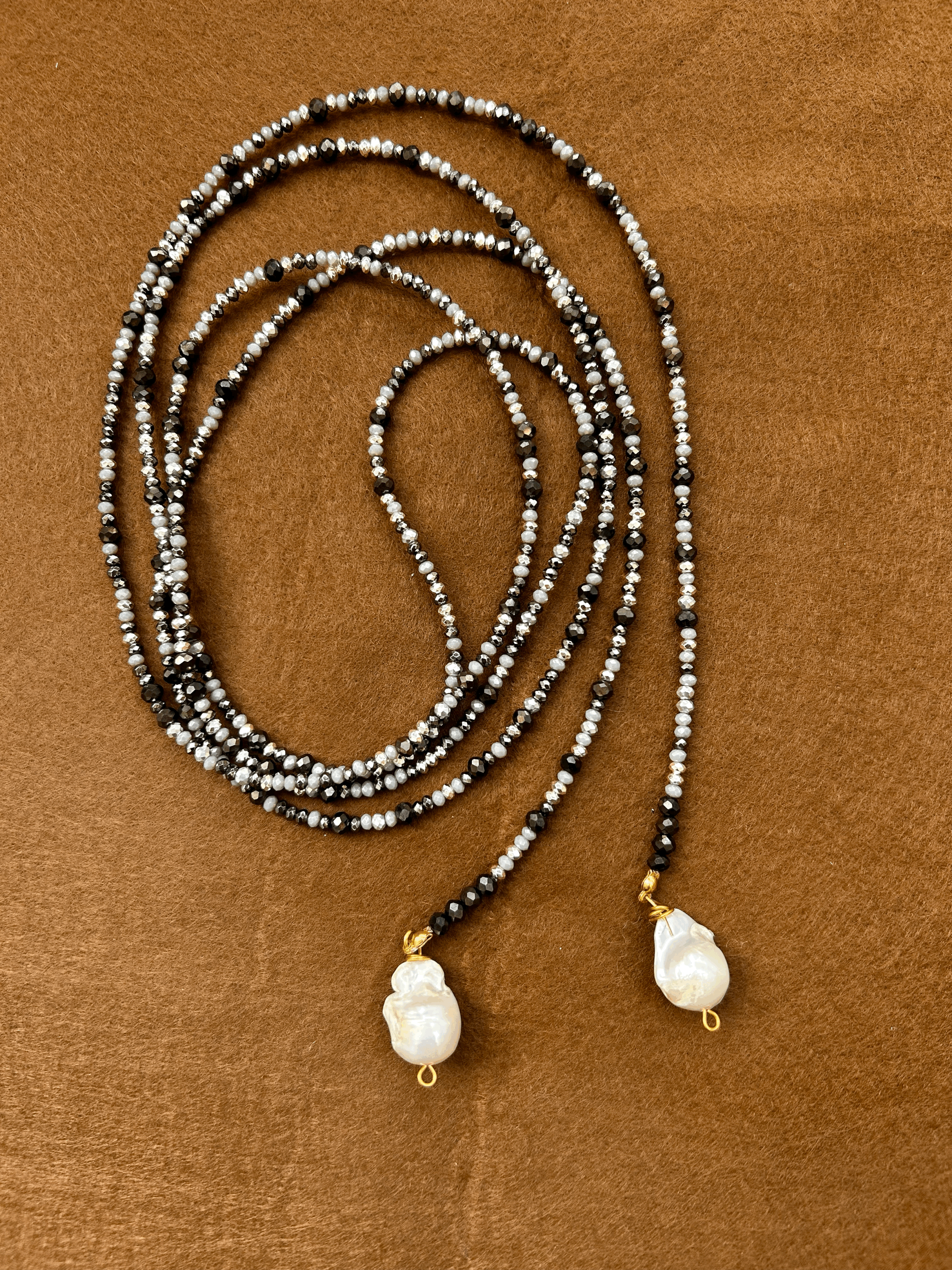 Spaghetti argento con perle di fiume