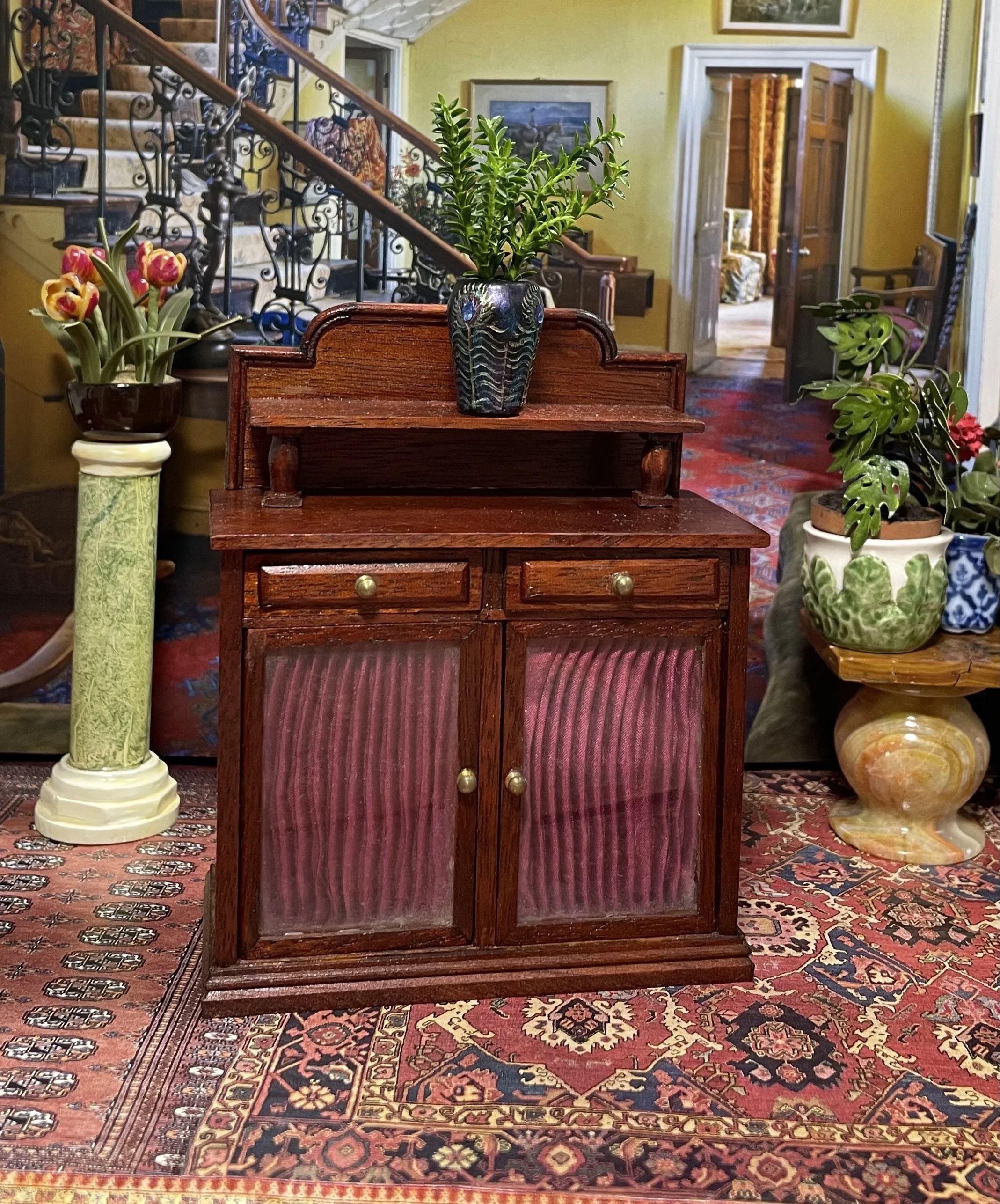 Sideboard with red fabric detail