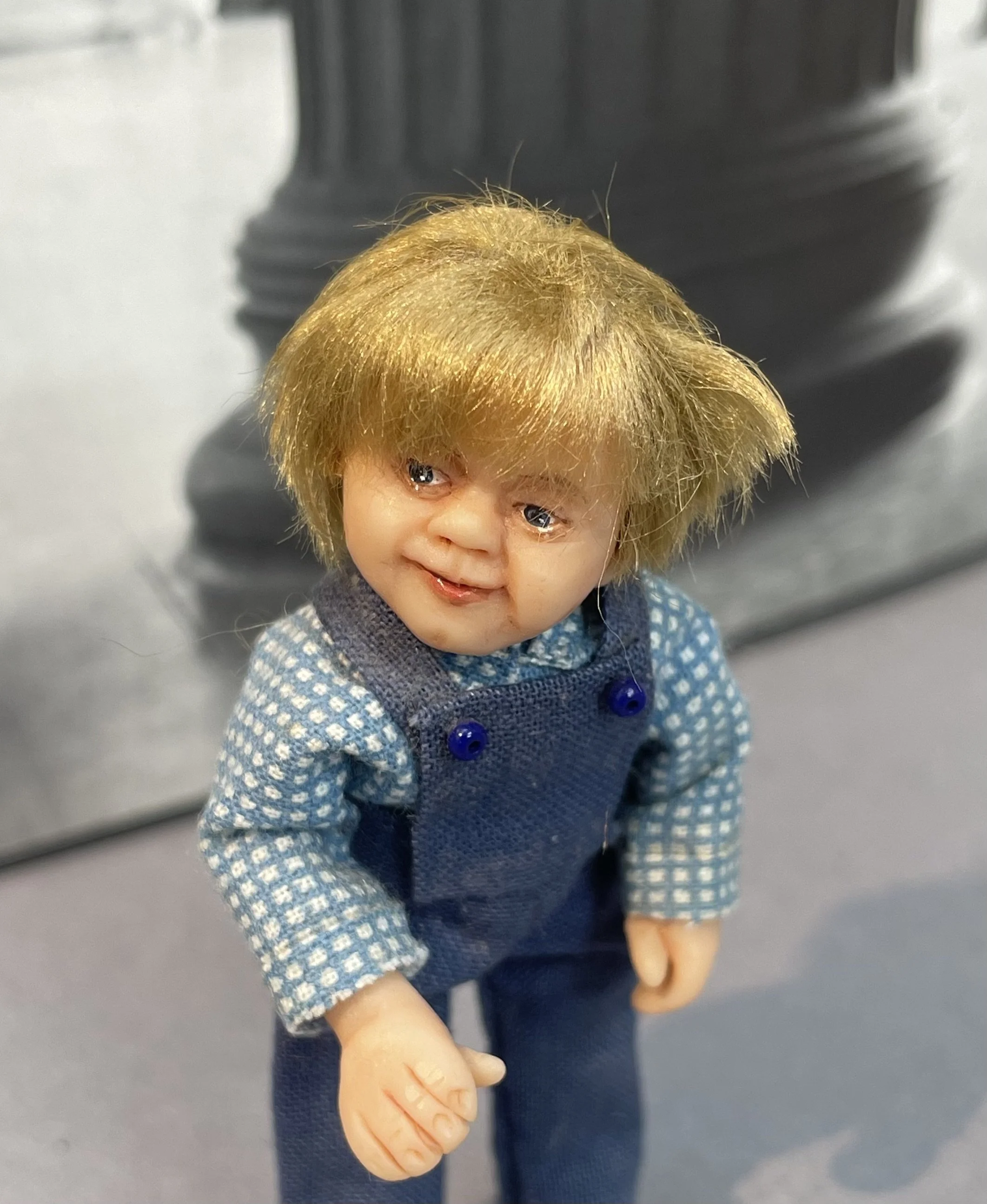 Toddler in dungarees