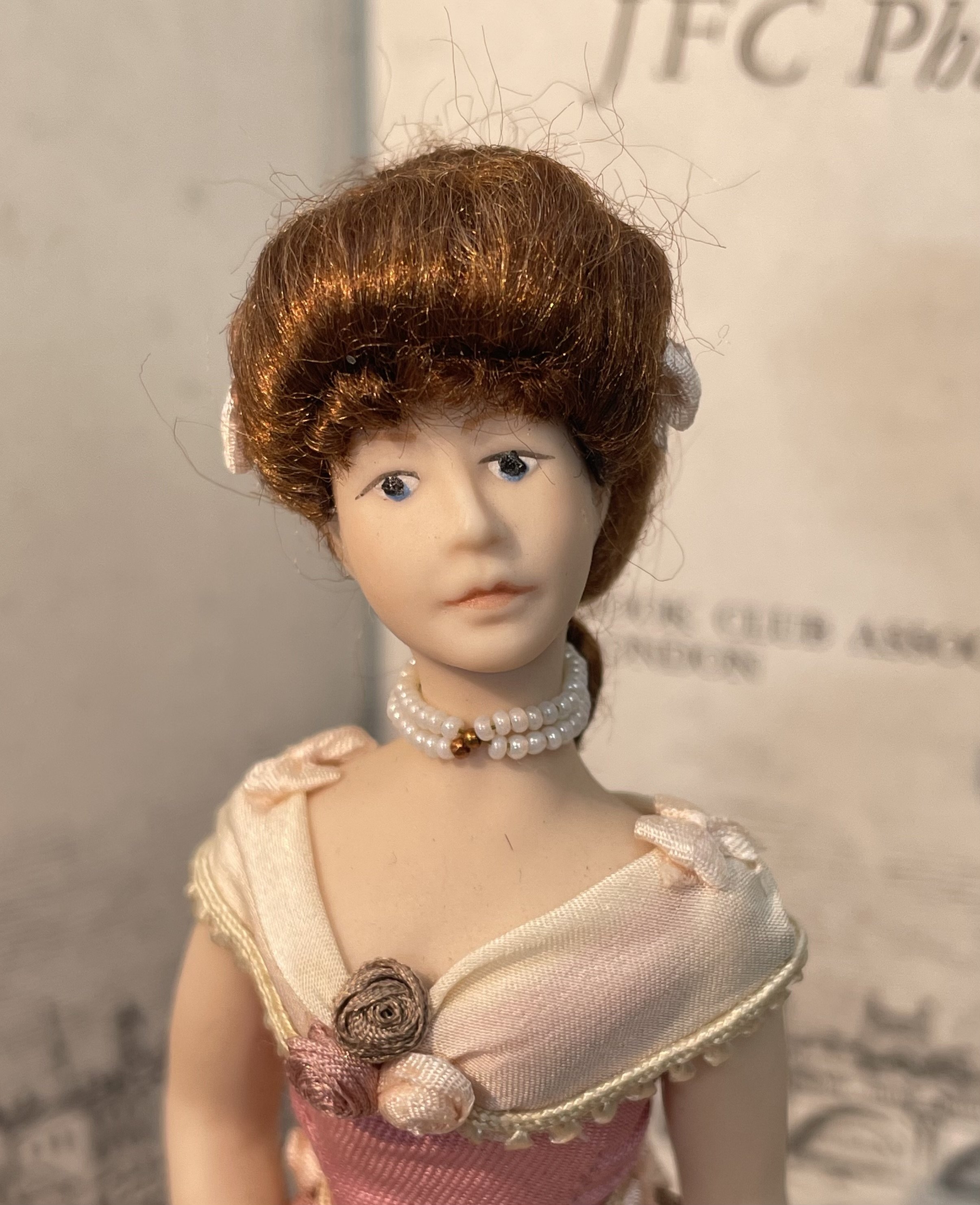 Young girl in pale pink evening gown