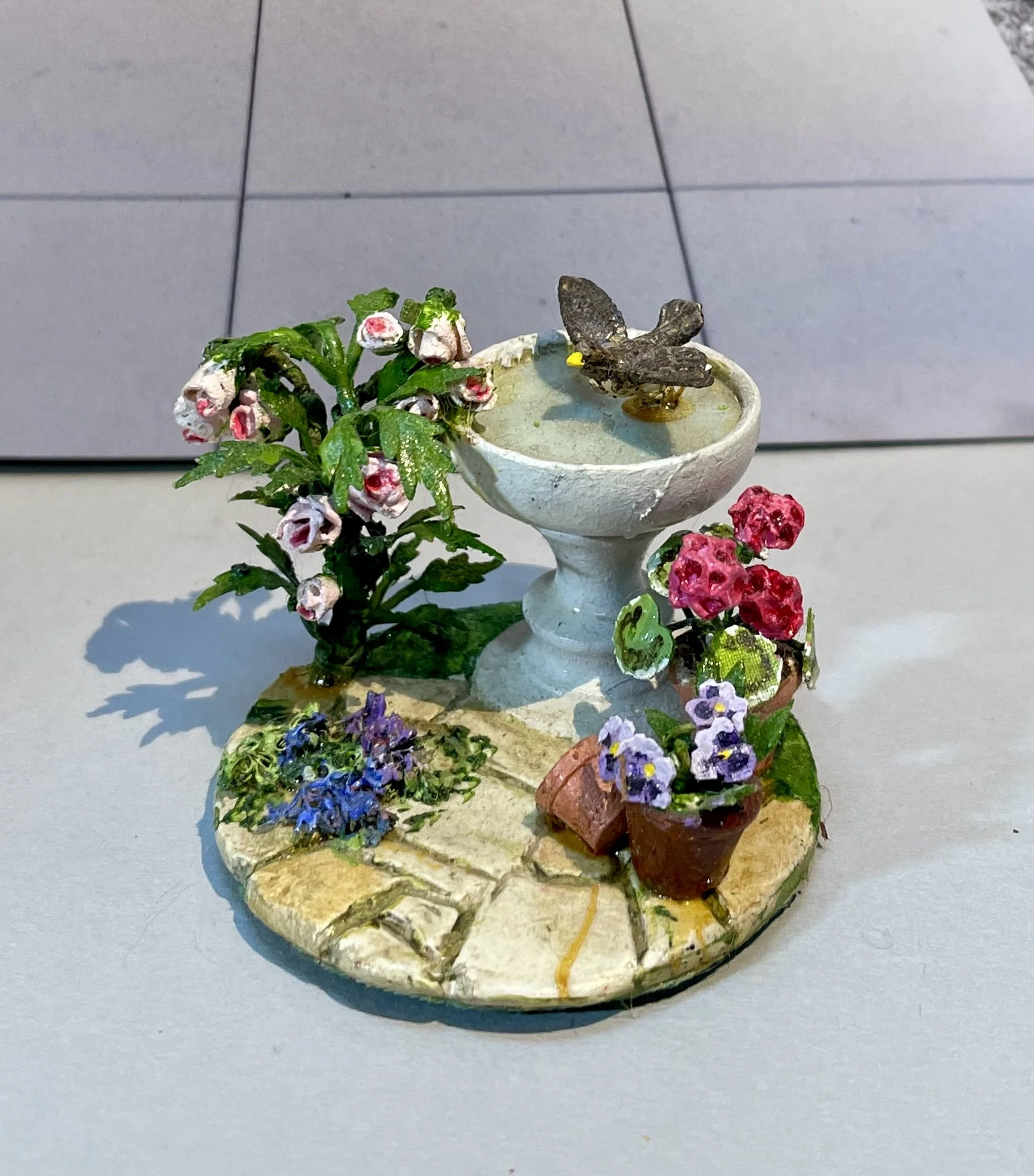 Birdbath with flowers & bird