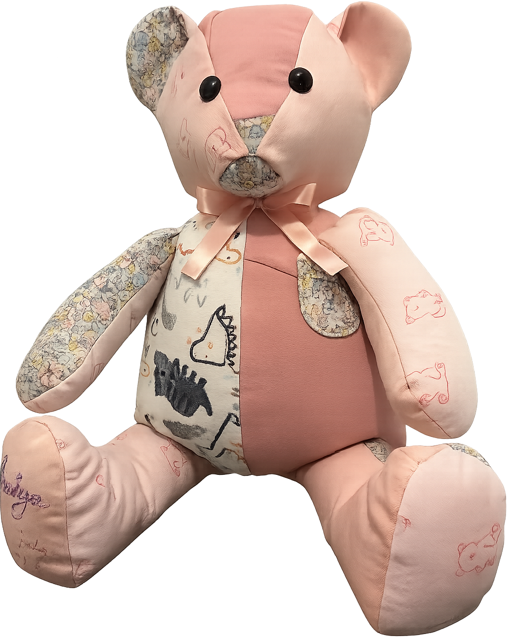 A patchwork teddy bear with a pink bow tie, featuring various fabric patterns, including floral and animal prints, with stitched outlines of animal sketches.