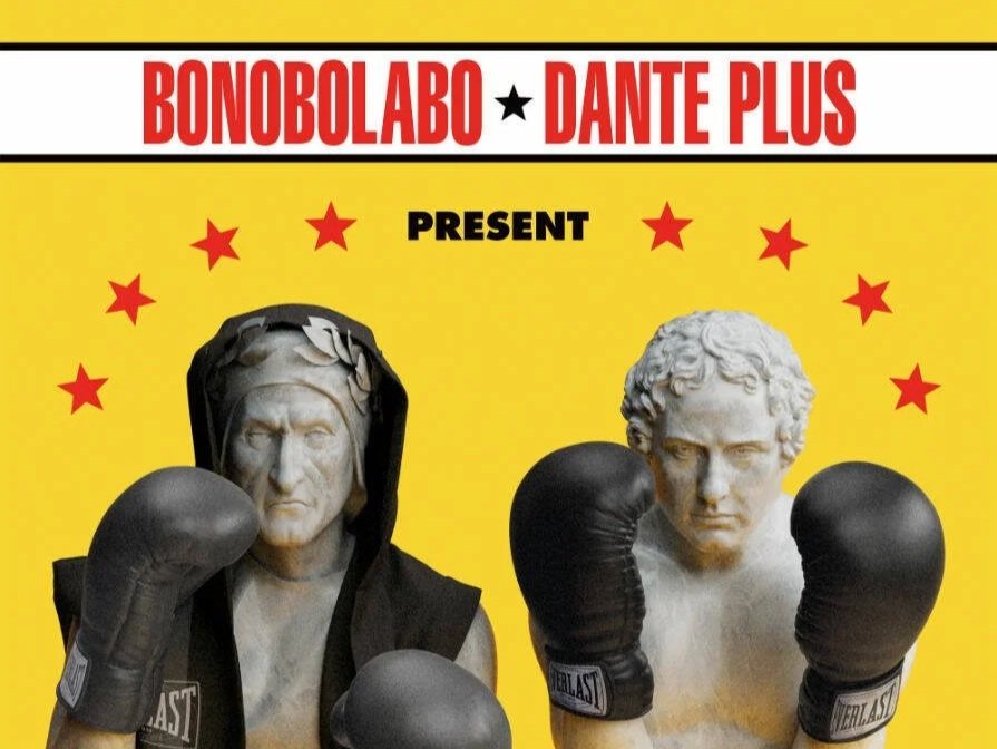 Illustrazione di Dante Alighieri e Bison con guantoni da boxe neri, su sfondo giallo con stelle rosse e testo promozionale.