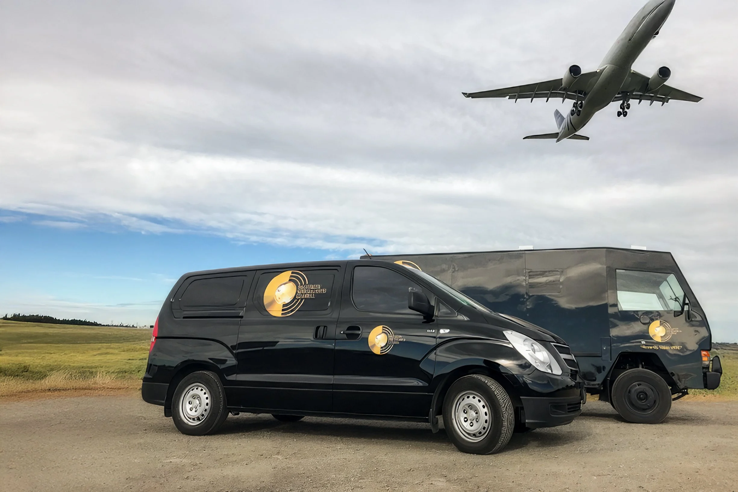 Image of a Security Specialists Global van and armoured truck on an airport driveway with a plane flying overhead