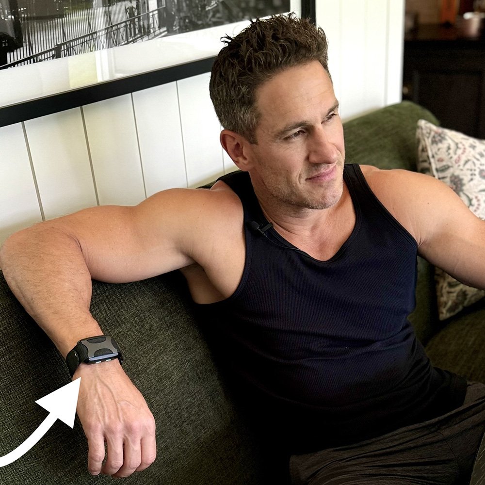 Don Saladino sitting on a sofa wearing his Apollo.