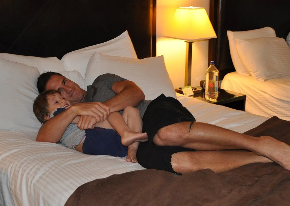 Don and little Donny relaxing in bed at the end of the day.