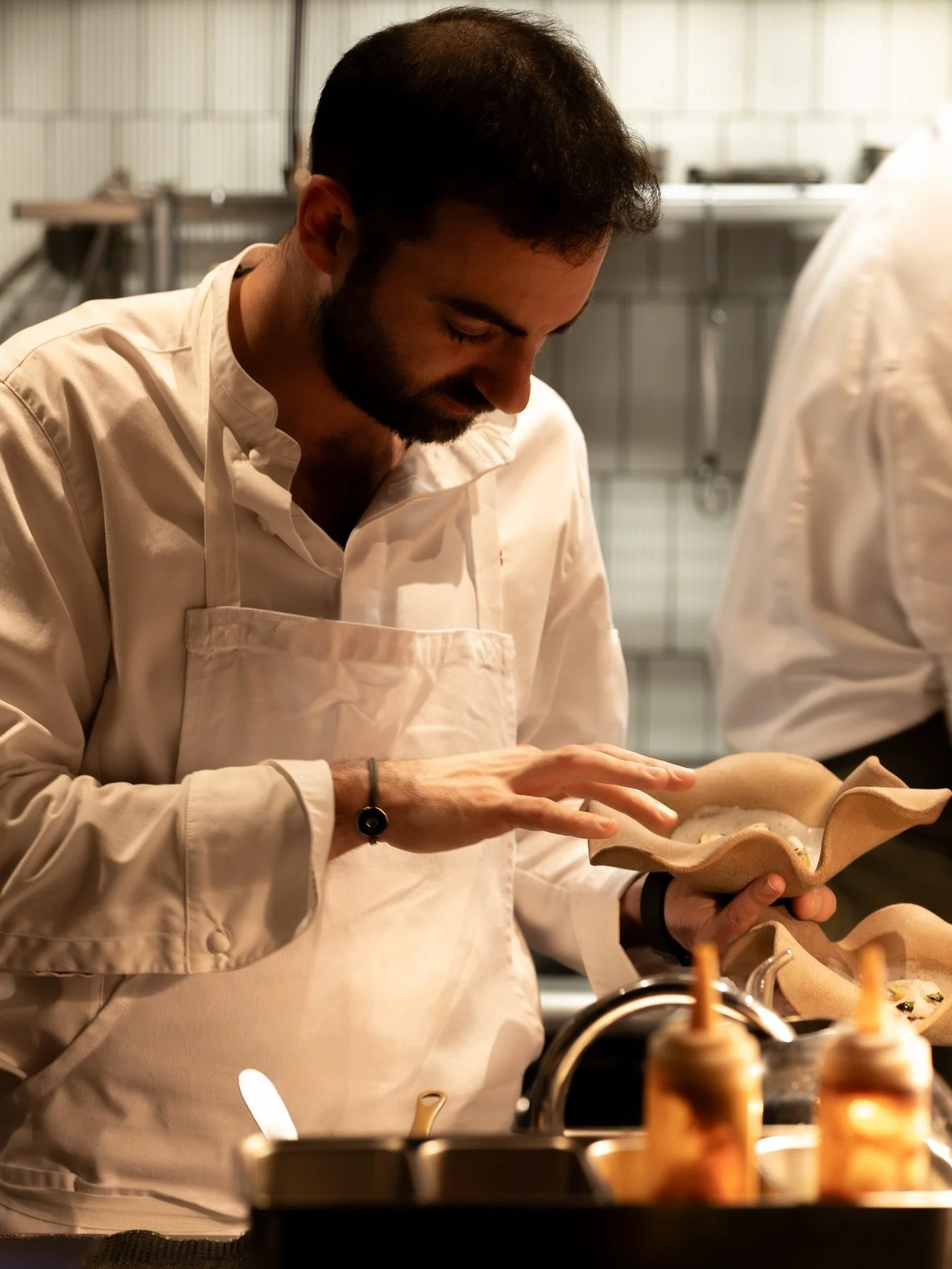 Bespoke ceramics by @amandehaeghen , crafted as functional architecture for the dish and made specifically for NHOMe&rsquo;s table.

📷 @byanaisfremont
#ceramicart #tableart #designandfood moderncuisine finedining