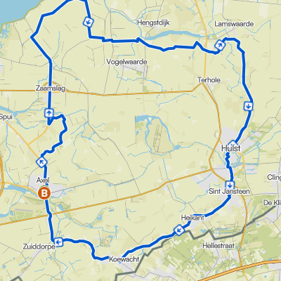 Een route op een kaart in Nederland rondom steden zoals Hulst, Koewacht, Axel en Zeddorp.