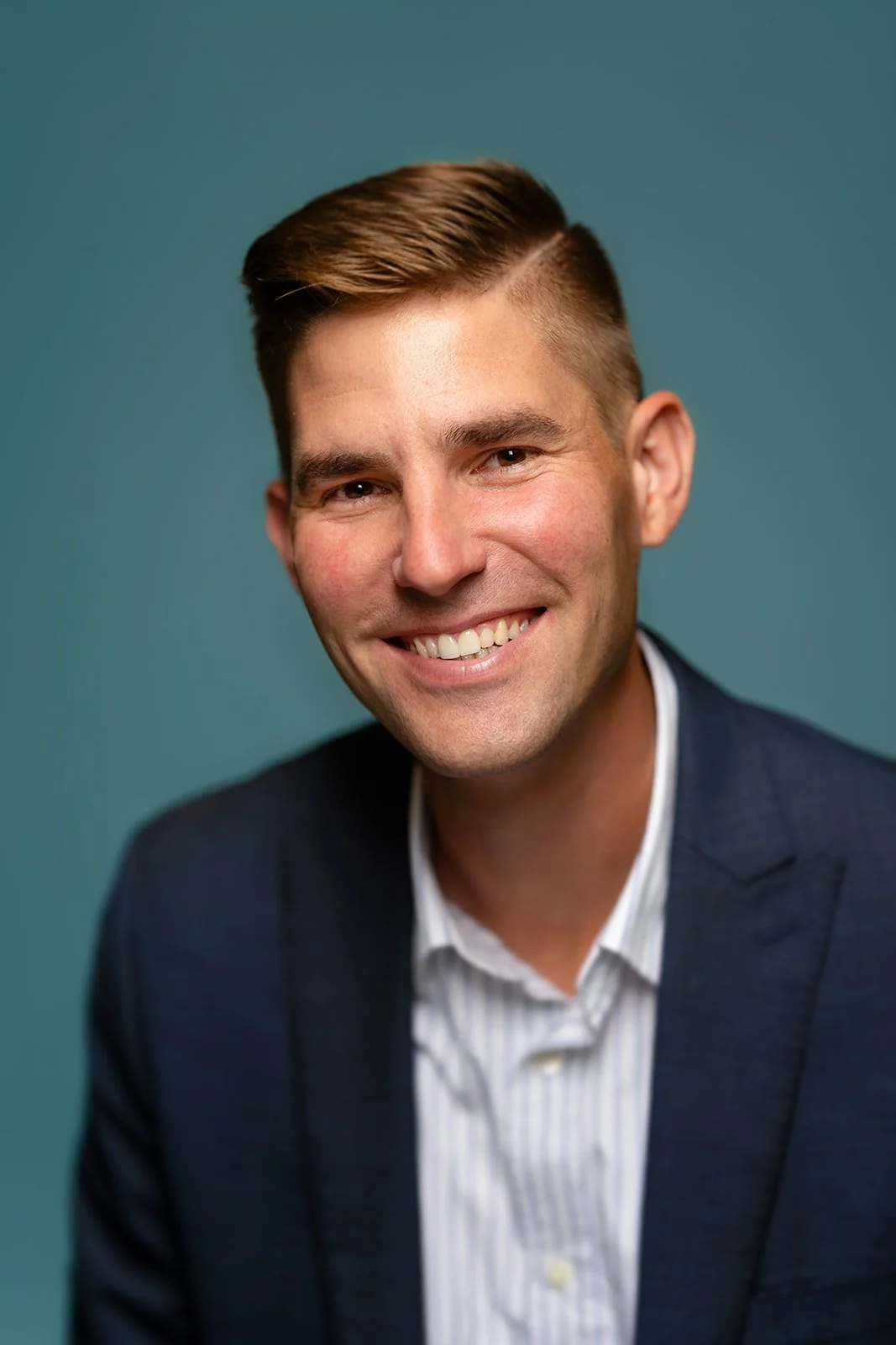 photo of a young accountant posing for a photo in studio