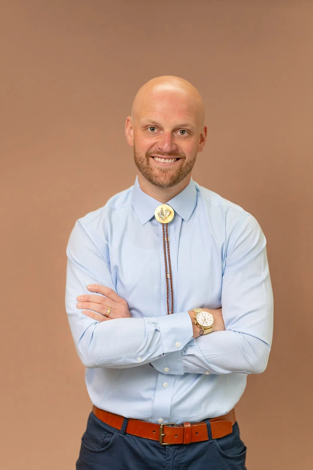 photo of a young businessman smiling for a portrait